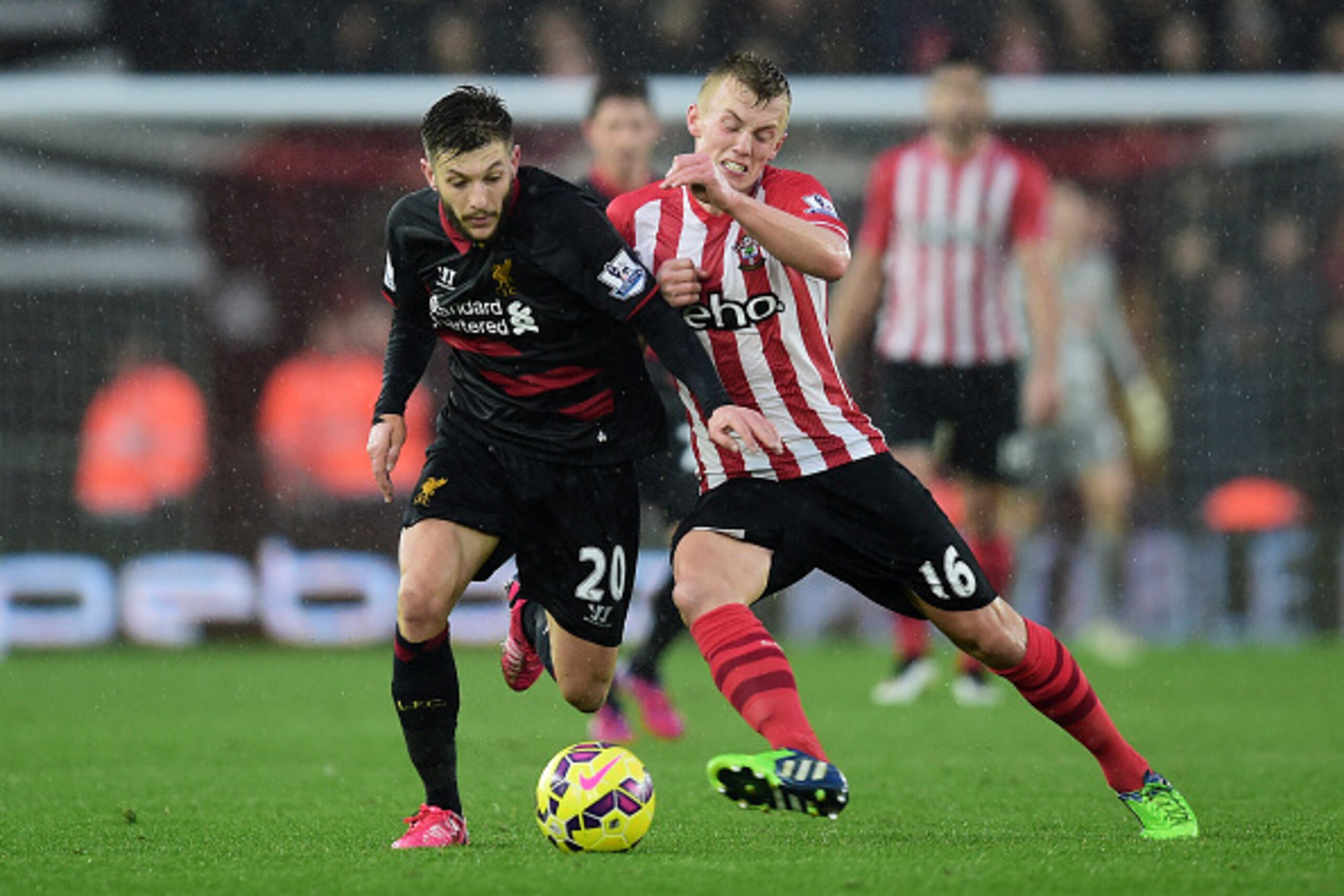 SOUTHAMPTON, ENGLAND - FEBRUARY 22: Adam Lallana of Liverpool and James Ward-Prowse of Southampton compete for the ball during the Barclays Premier League match between Southampton and Liverpool at St Mary's Stadium on February 22, 2015 in Southampton, E SOUTHAMPTON, ENGLAND - FEBRUARY 22: Adam Lallana of Liverpool and James Ward-Prowse of Southampton compete for the ball during the Barclays Premier League match between Southampton and Liverpool at St Mary's Stadium on February 22, 2015 in Southampton, E