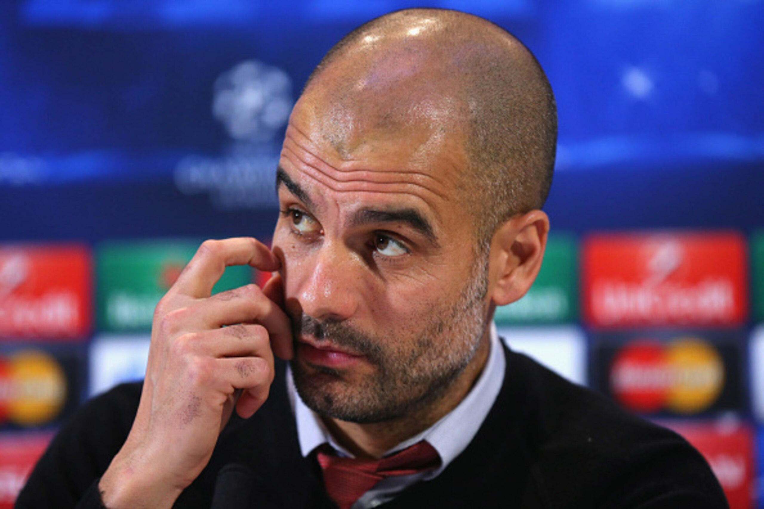 MANCHESTER, ENGLAND - NOVEMBER 24:  Pep Guardiola the coach of FC Bayern Muenchen faces the media during a press conference at the Lowry Hotel on November 24, 2014 in Manchester, United Kingdom.  (Photo by Alex Livesey/Getty Images)