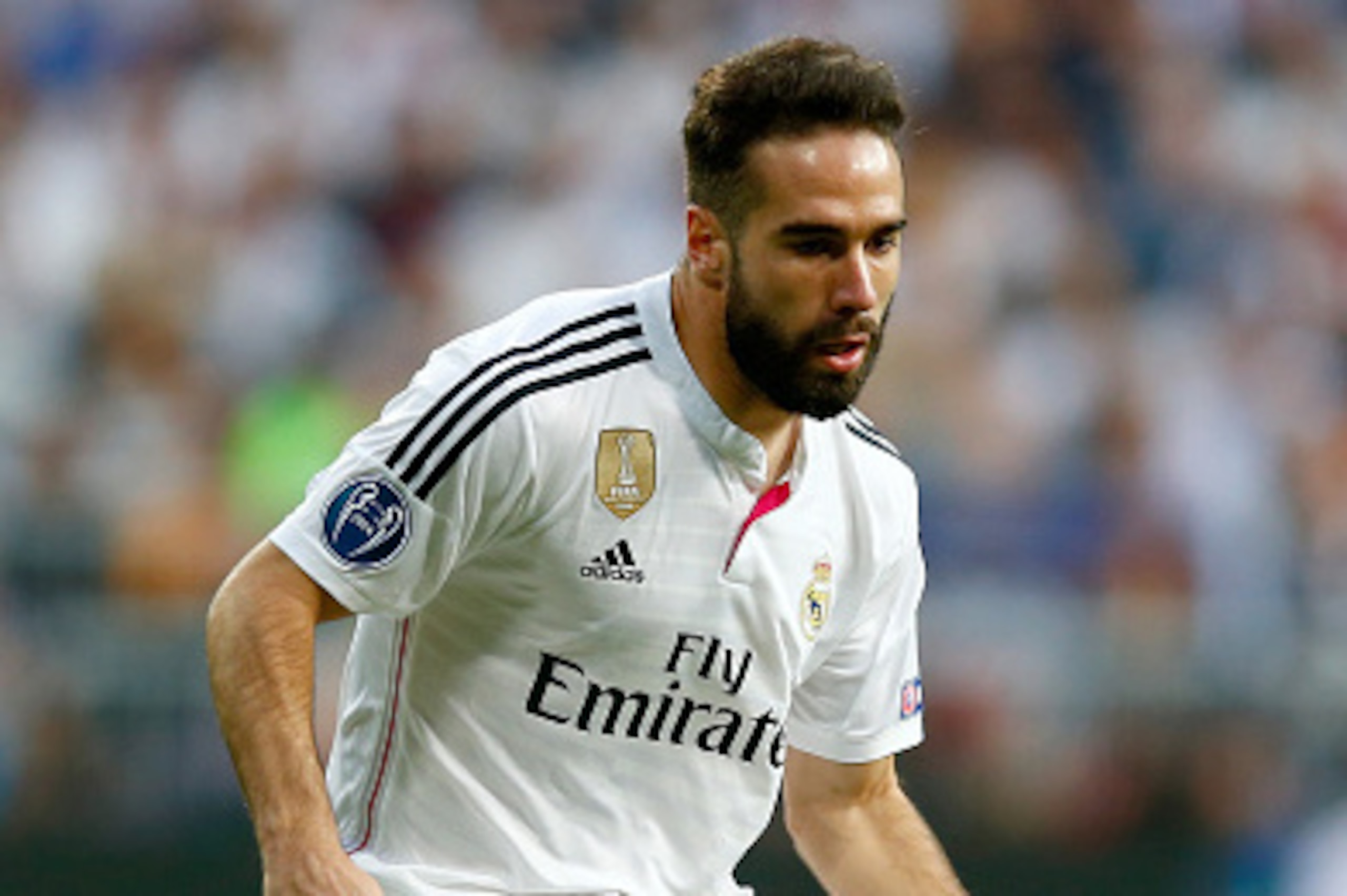 MADRID, SPAIN - APRIL 22:  Dani Carvajal of Real Madrid CF in action during the UEFA Champions League quarter-final second leg match between Real Madrid CF and Club Atletico de Madrid at Bernabeu on April 22, 2015 in Madrid, Spain  (Photo by Clive Rose/Ge