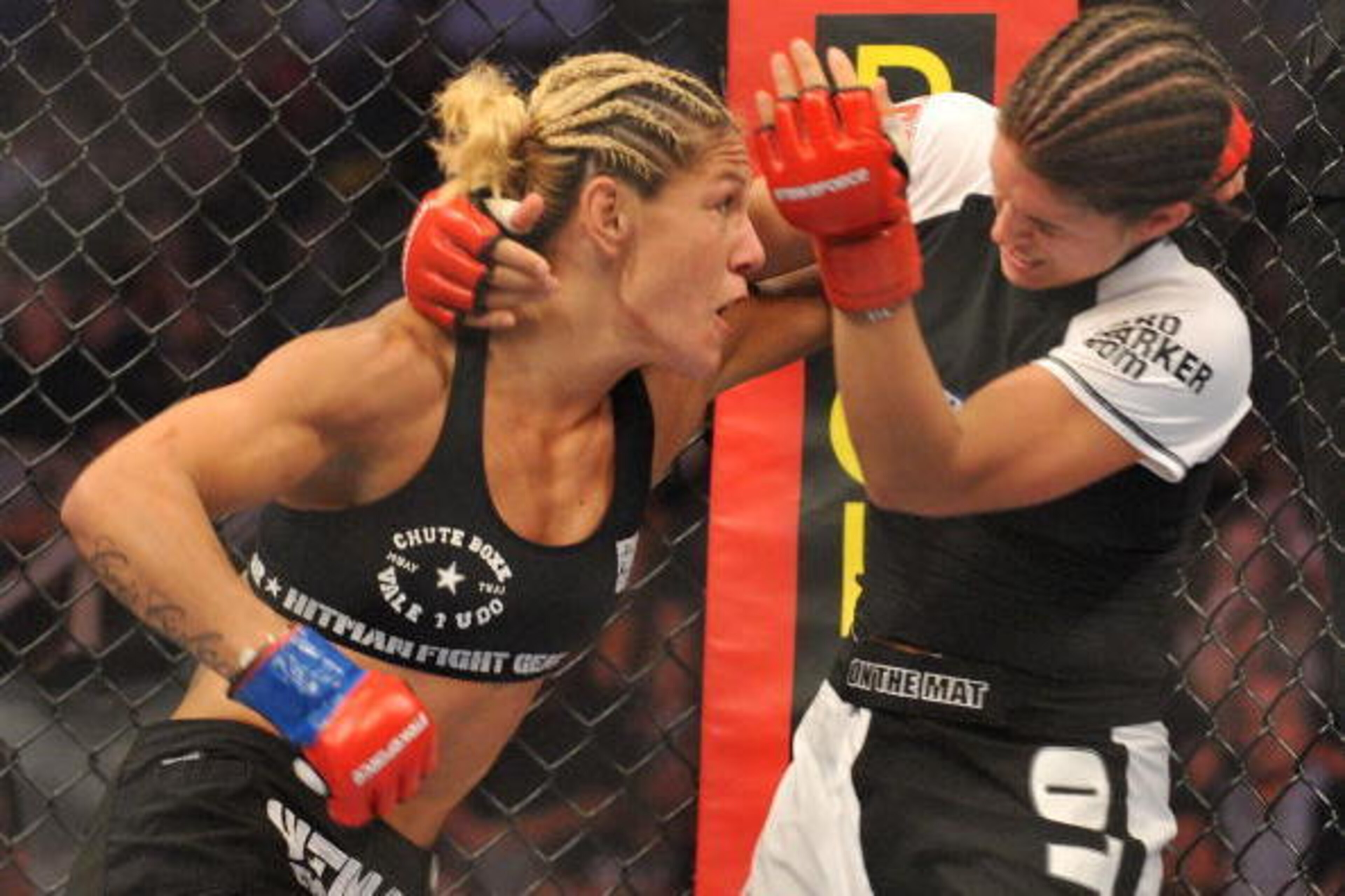 SAN JOSE, CA - AUGUST 15:  Cris Cyborg (L) battles Gina Carano during their Middleweight Championship fight at Stikeforce: Carano vs. Cyborg on August 15, 2009 in San Jose, California.  (Photo by Jon Kopaloff/Getty Images)