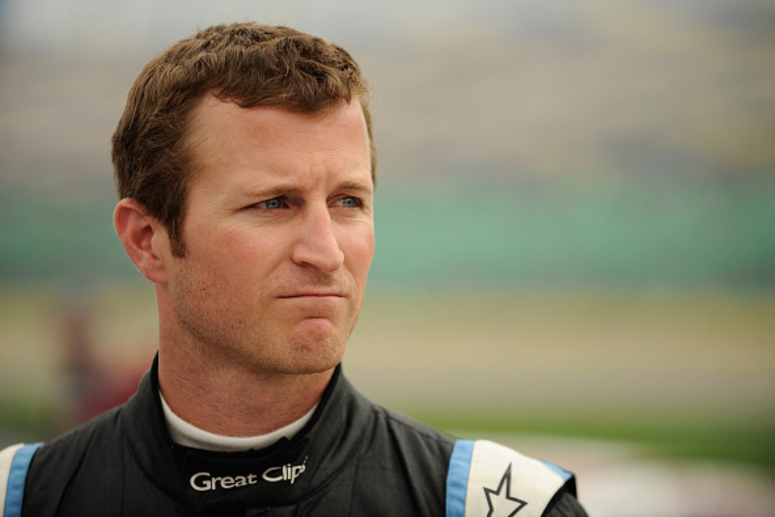 KANSAS CITY, KS - MAY 08:  Kasey Kahne, driver of the #5 Great Clips Chevrolet, stands on the grid during qualifying for the NASCAR Sprint Cup Series SpongeBob SquarePants 400 at Kansas Speedway on May 8, 2015 in Kansas City, Kansas.  (Photo by Ed Zurga/G