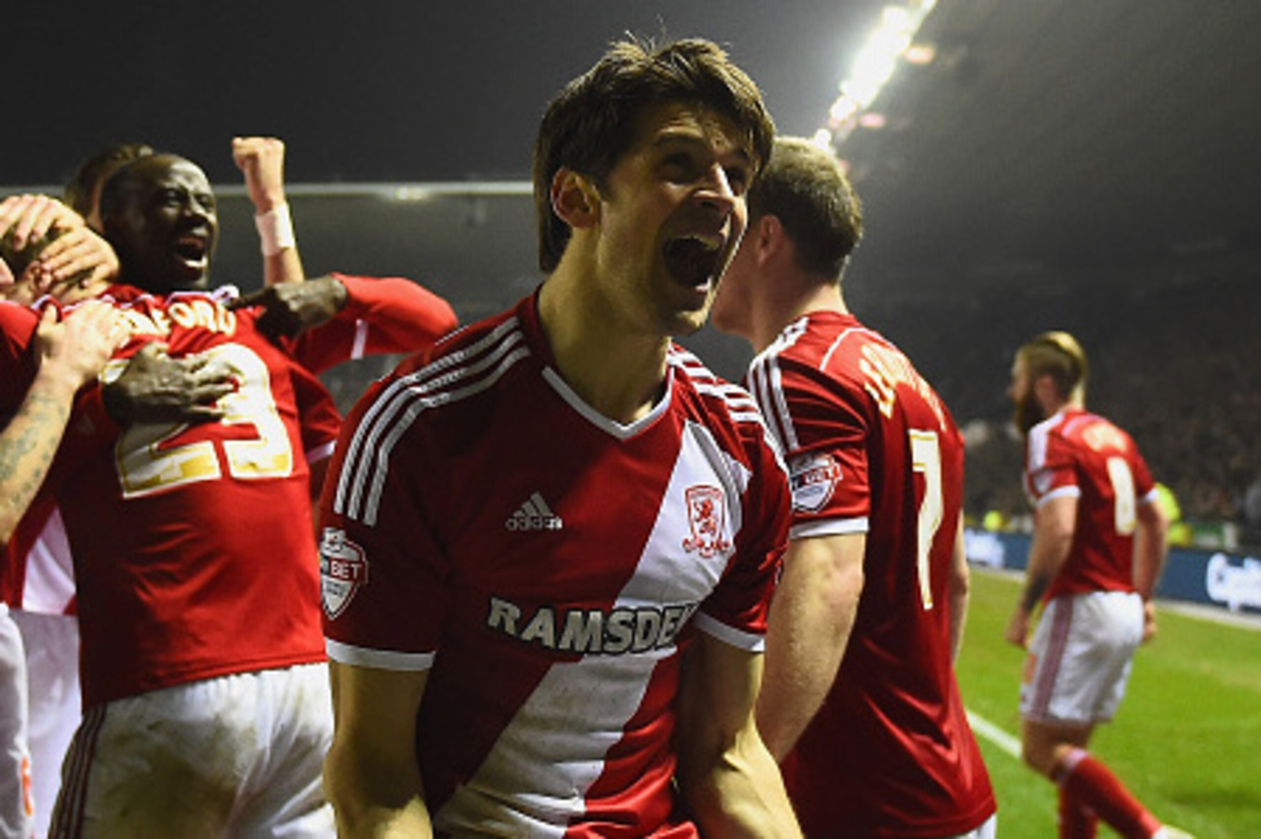 DERBY, ENGLAND - MARCH 17: George Friend of Middlesbrough celebrates as Patrick Bamford of Middlesbrough is congratulated by team mates behind during the Sky Bet Championship match between Derby County and Middlesbrough at iPro Stadium on March 17, 2015 i DERBY, ENGLAND - MARCH 17: George Friend of Middlesbrough celebrates as Patrick Bamford of Middlesbrough is congratulated by team mates behind during the Sky Bet Championship match between Derby County and Middlesbrough at iPro Stadium on March 17, 2015 i