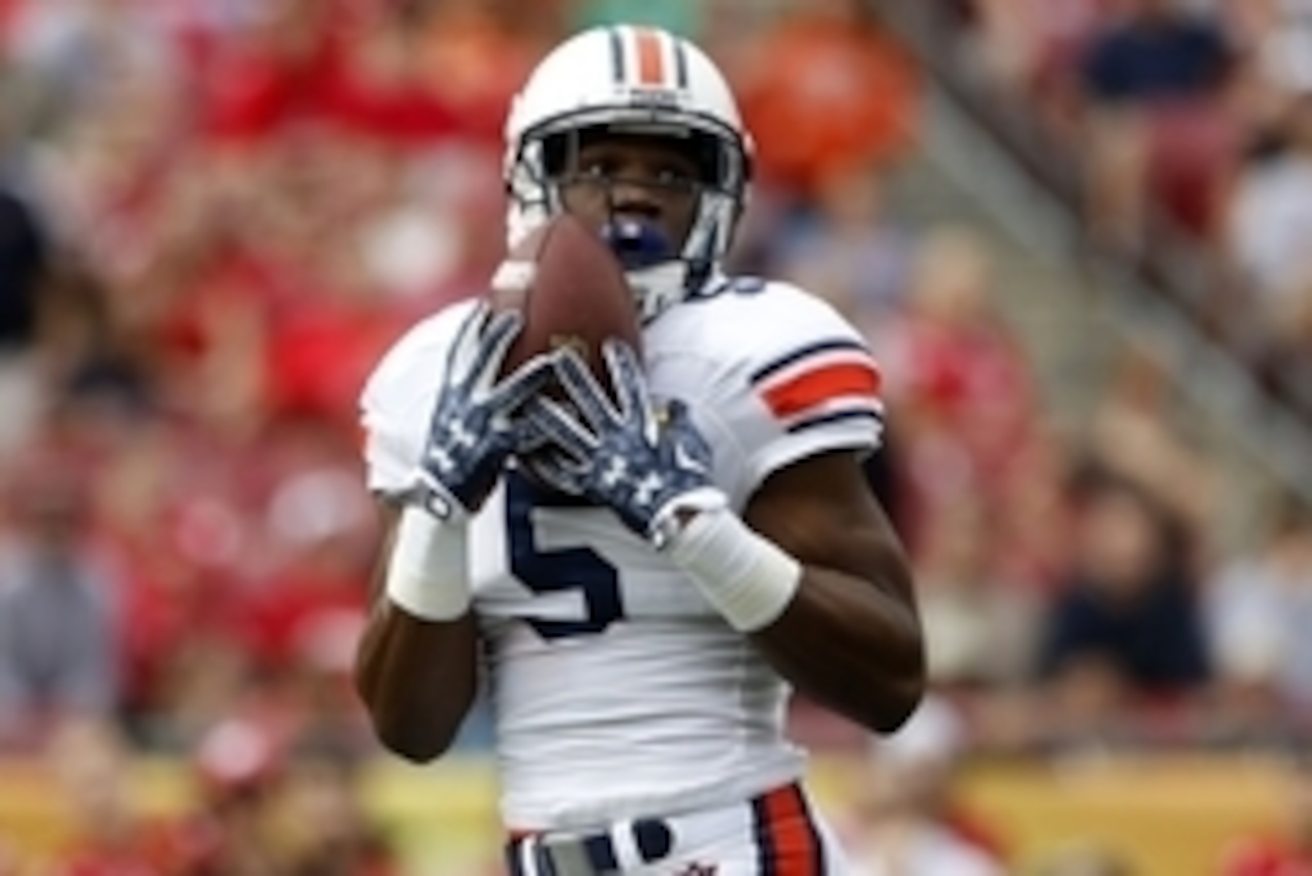 Jan 1, 2015; Tampa, FL, USA; Auburn Tigers wide receiver Ricardo Louis (5) catches the ball for a touchdown against the Wisconsin Badgers during the first half in the 2015 Outback Bowl at Raymond James Stadium. Mandatory Credit: Mark Zerof-USA TODAY Sport Jan 1, 2015; Tampa, FL, USA; Auburn Tigers wide receiver Ricardo Louis (5) catches the ball for a touchdown against the Wisconsin Badgers during the first half in the 2015 Outback Bowl at Raymond James Stadium. Mandatory Credit: Mark Zerof-USA TODAY Sport