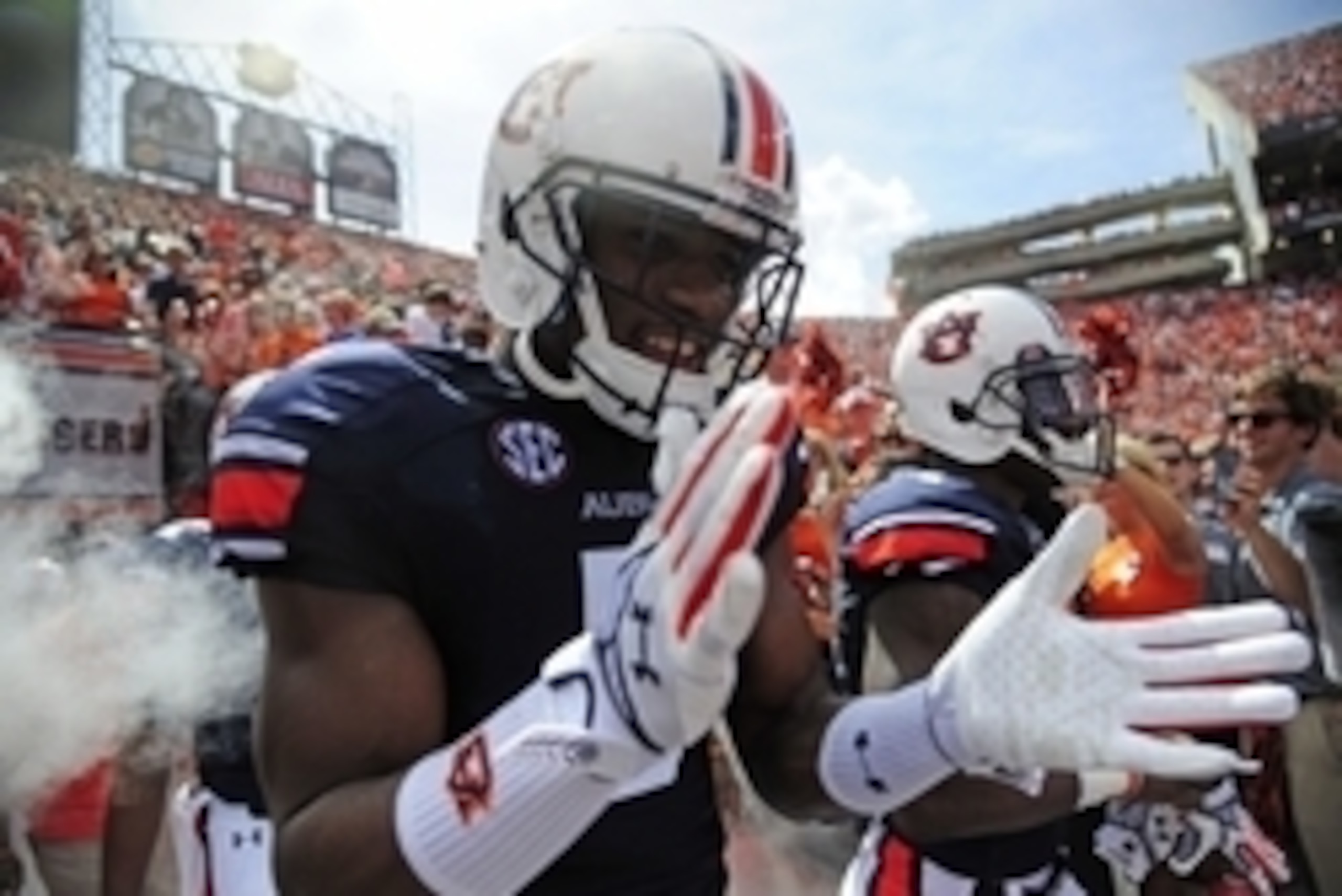 Aug 30, 2014; Auburn, AL, USA; Auburn Tigers wide receiver Ricardo Louis (5) walks onto the field for the game against the Arkansas Razorbacks at Jordan Hare Stadium. Mandatory Credit: Shanna Lockwood-USA TODAY Sports Aug 30, 2014; Auburn, AL, USA; Auburn Tigers wide receiver Ricardo Louis (5) walks onto the field for the game against the Arkansas Razorbacks at Jordan Hare Stadium. Mandatory Credit: Shanna Lockwood-USA TODAY Sports