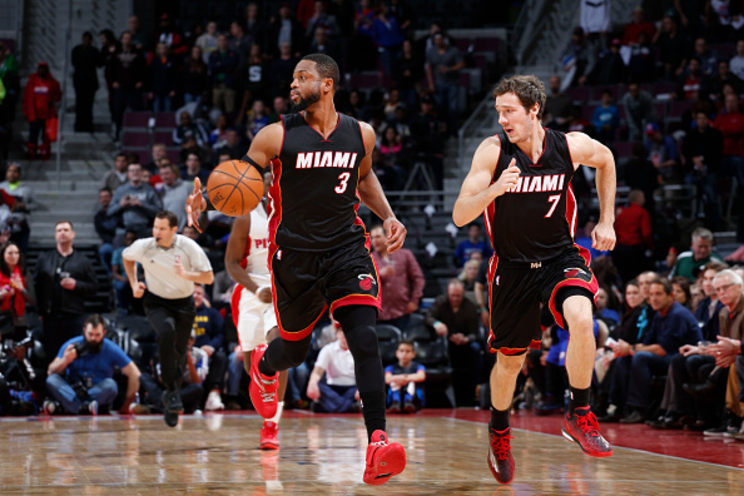 AUBURN HILLS, MI - APRIL 4: Dwyane Wade #3 drives to the basket along side Goran Dragic #7 of the Miami Heat during the game against the Detroit Pistons on April 4, 2015 at The Palace of Auburn Hills in Auburn Hills, Michigan. NOTE TO USER: User expressly AUBURN HILLS, MI - APRIL 4: Dwyane Wade #3 drives to the basket along side Goran Dragic #7 of the Miami Heat during the game against the Detroit Pistons on April 4, 2015 at The Palace of Auburn Hills in Auburn Hills, Michigan. NOTE TO USER: User expressly