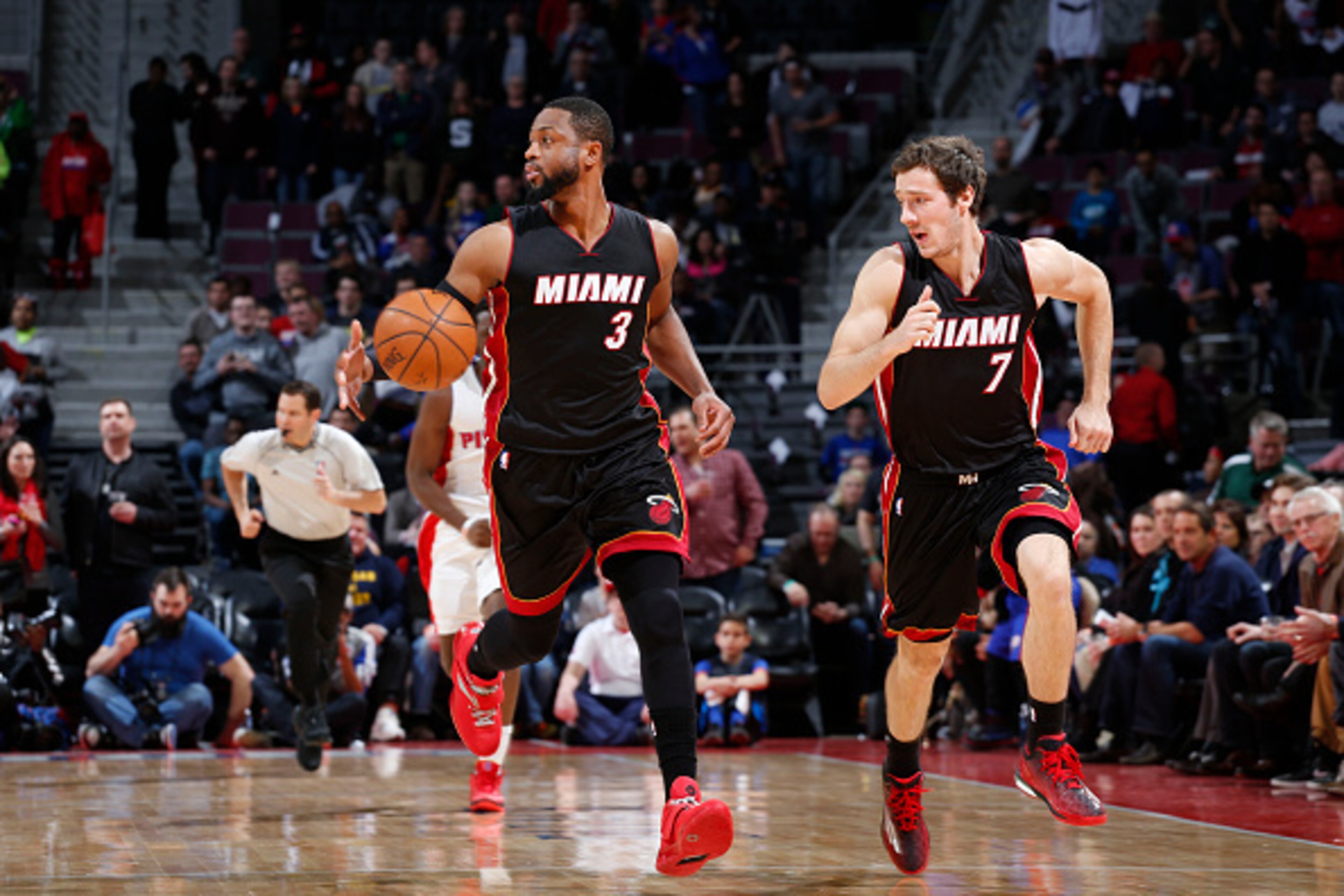 AUBURN HILLS, MI - APRIL 4: Dwyane Wade #3 drives to the basket along side Goran Dragic #7 of the Miami Heat during the game against the Detroit Pistons on April 4, 2015 at The Palace of Auburn Hills in Auburn Hills, Michigan. NOTE TO USER: User expressly