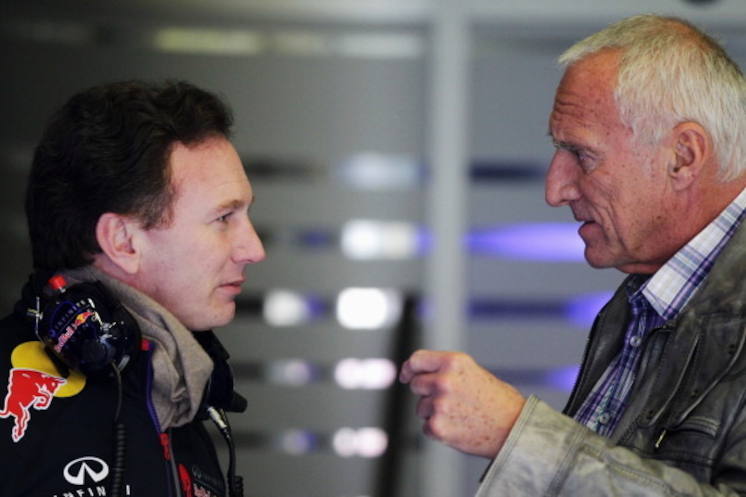 JEREZ DE LA FRONTERA, SPAIN - JANUARY 30:  Red Bull owner Dietrich Mateschitz (R) talks with Infiniti Red Bull Racing Team Principal Christian Horner (L) during day three of Formula One Winter Testing at the Circuito de Jerez on January 30, 2014 in Jerez 