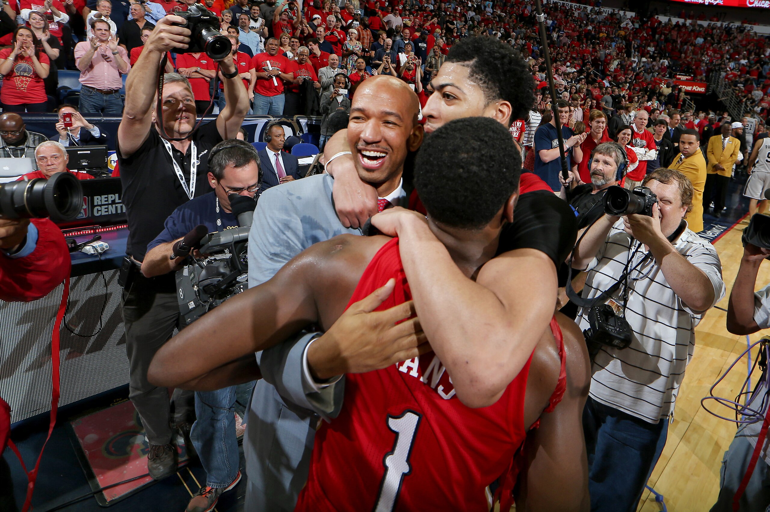 NEW ORLEANS, LA - APRIL 15: Head coach, Monty Williams Pelicans, Anthony Davis #23 and Tyreke Evans #1 of the New Orleans Pelicans after the win against the San Antonio Spurs on April 15, 2015 at Smoothie King Center in New Orleans, Louisiana. NOTE TO USE NEW ORLEANS, LA - APRIL 15: Head coach, Monty Williams Pelicans, Anthony Davis #23 and Tyreke Evans #1 of the New Orleans Pelicans after the win against the San Antonio Spurs on April 15, 2015 at Smoothie King Center in New Orleans, Louisiana. NOTE TO USE