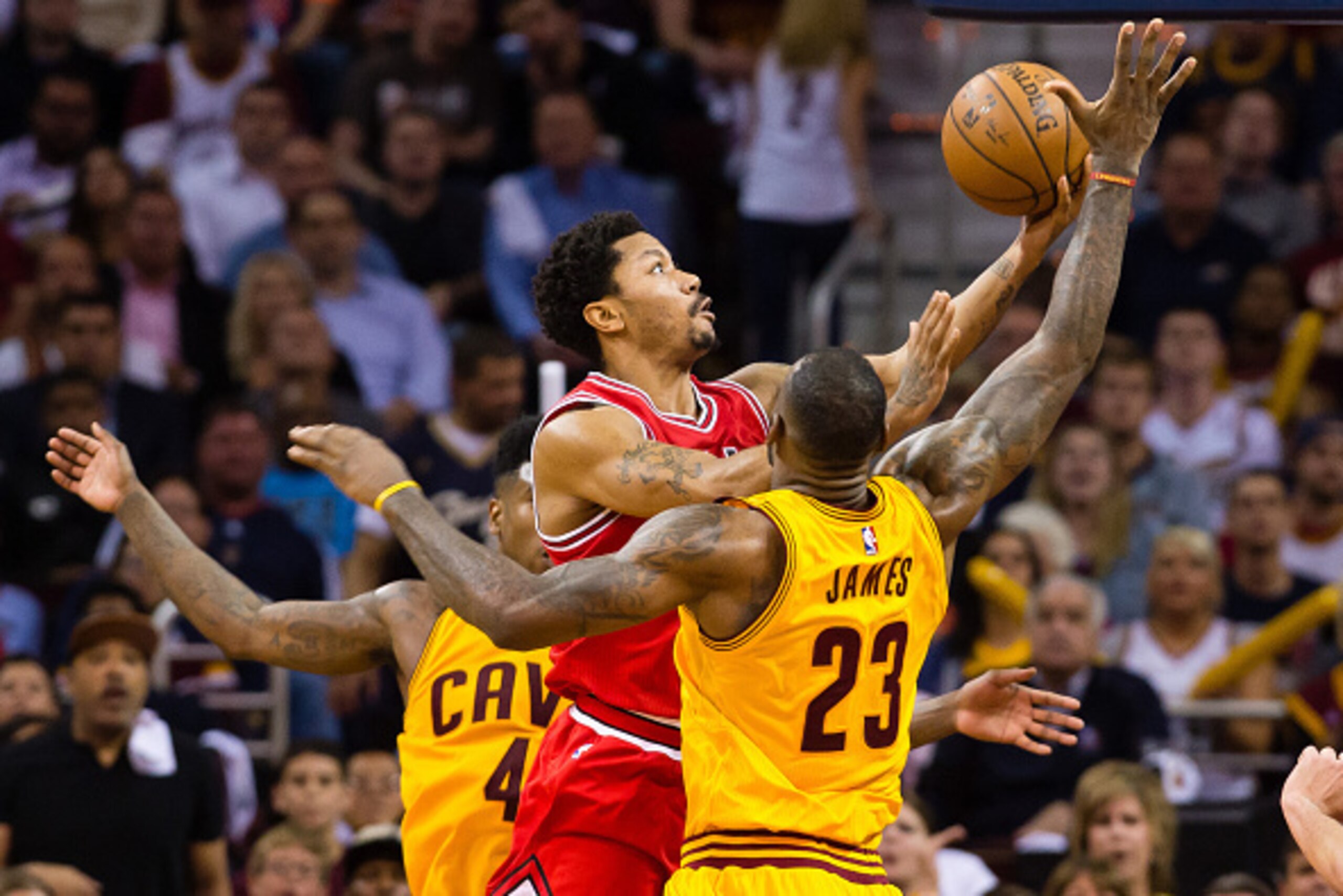 CLEVELAND, OH - MAY 12: Derrick Rose #1 of the Chicago Bulls shoots over LeBron James #23 of the Cleveland Cavaliers in the first half during Game Five in the Eastern Conference Semifinals of the 2015 NBA Playoffs 2015 at Quicken Loans Arena on May 12, 2 CLEVELAND, OH - MAY 12: Derrick Rose #1 of the Chicago Bulls shoots over LeBron James #23 of the Cleveland Cavaliers in the first half during Game Five in the Eastern Conference Semifinals of the 2015 NBA Playoffs 2015 at Quicken Loans Arena on May 12, 2