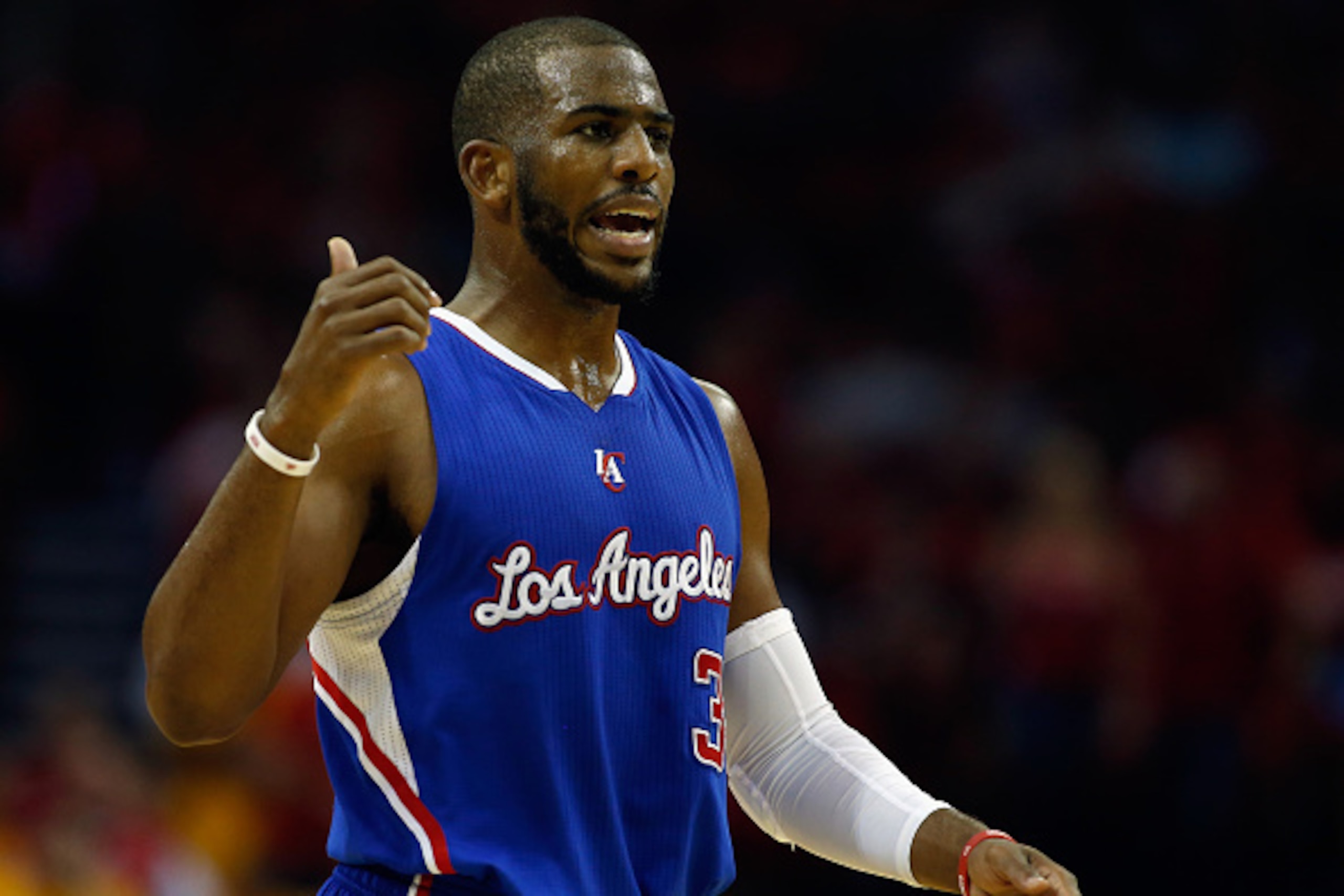 HOUSTON, TX - MAY 12:  Chris Paul #3 of the Los Angeles Clippers reacts after a play against the Houston Rockets during Game Five of the Western Conference Semifinals at the Toyota Center for the 2015 NBA Playoffs on May 12, 2015 in Houston, Texas.  NOTE 
