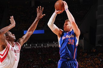 HOUSTON, TX - MAY 12: Blake Griffin #32 of the Los Angeles Clippers shoots against Terrence Jones #6 of the Houston Rockets during Game Five of the Western Conference Semifinals during the NBA Playoffs on May 12, 2015 at Toyota Center in Houston, Texas.  