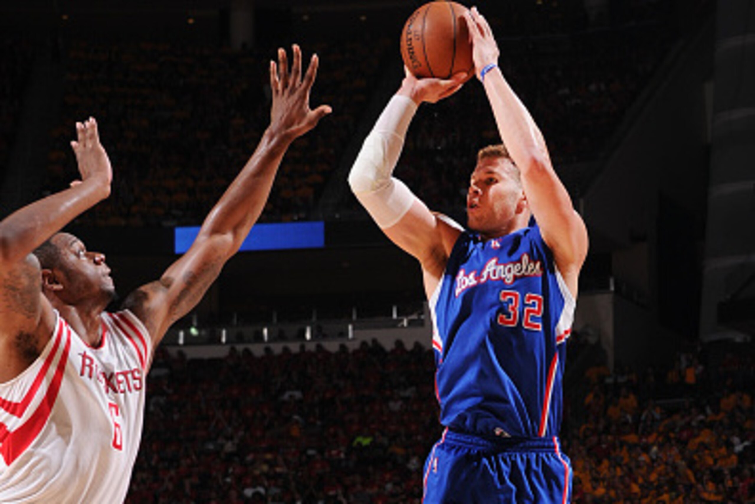 HOUSTON, TX - MAY 12: Blake Griffin #32 of the Los Angeles Clippers shoots against Terrence Jones #6 of the Houston Rockets during Game Five of the Western Conference Semifinals during the NBA Playoffs on May 12, 2015 at Toyota Center in Houston, Texas.  