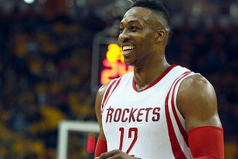 HOUSTON, TX - MAY 12:  Dwight Howard #12 of the Houston Rockets walks off the court against the Los Angeles Clippers during Game Five of the Western Conference Semifinals at the Toyota Center for the 2015 NBA Playoffs on May 12, 2015 in Houston, Texas.  N