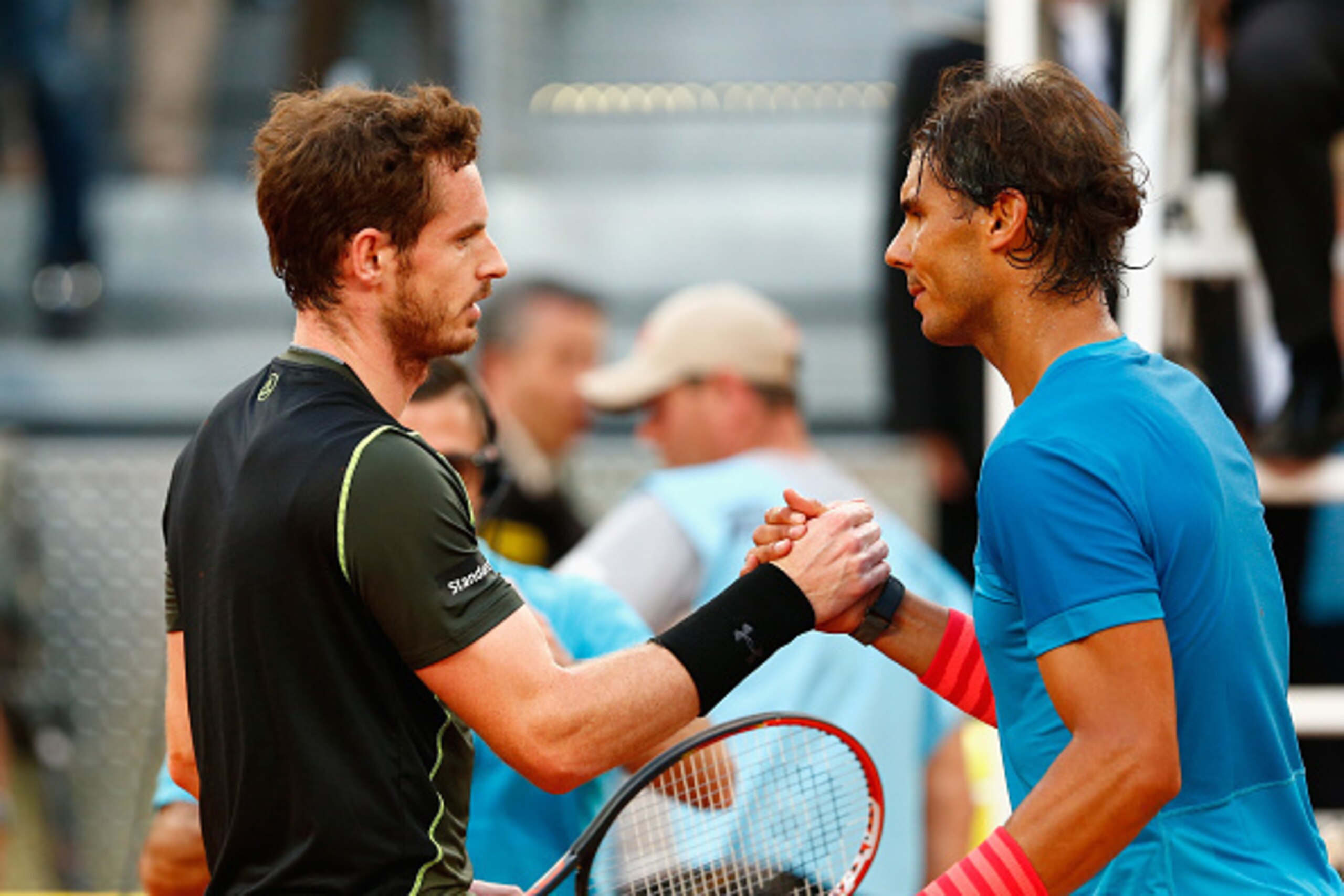 MADRID, SPAIN - MAY 10:  Andy Murray of Great Britain is congratulated by Rafael Nadal of Spain in the final during day nine of the Mutua Madrid Open tennis tournament at the Caja Magica on May 10, 2015 in Madrid, Spain.  (Photo by Julian Finney/Getty Ima