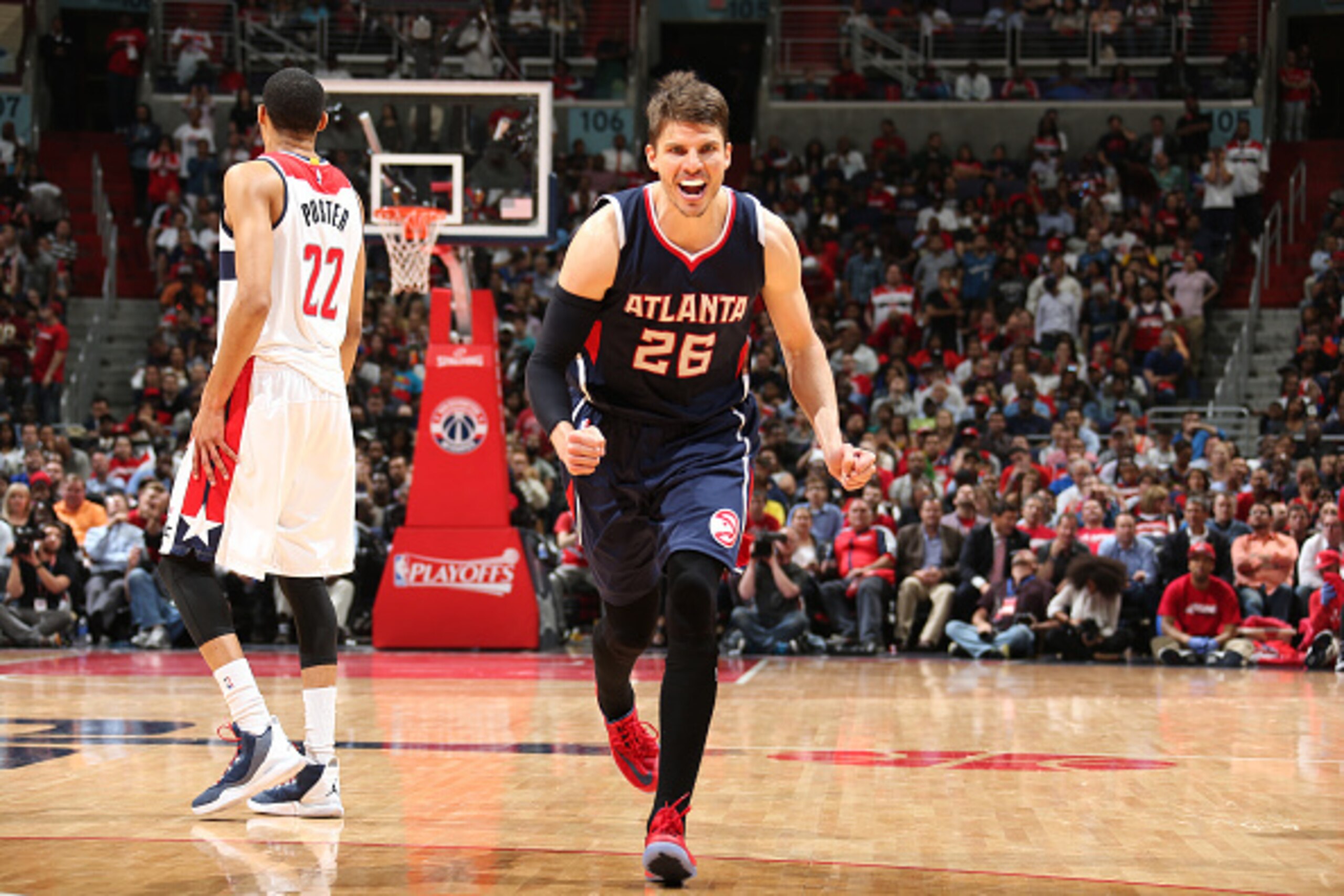 WASHINGTON, DC - MAY 11: Kyle Korver #26 of the Atlanta Hawks celebrates during a game against the Washington Wizards in Game Four of the Eastern Conference Semifinals of the 2015 NBA Playoffs at the Verizon Center on May 11, 2015 in Washington, DC. NOTE 