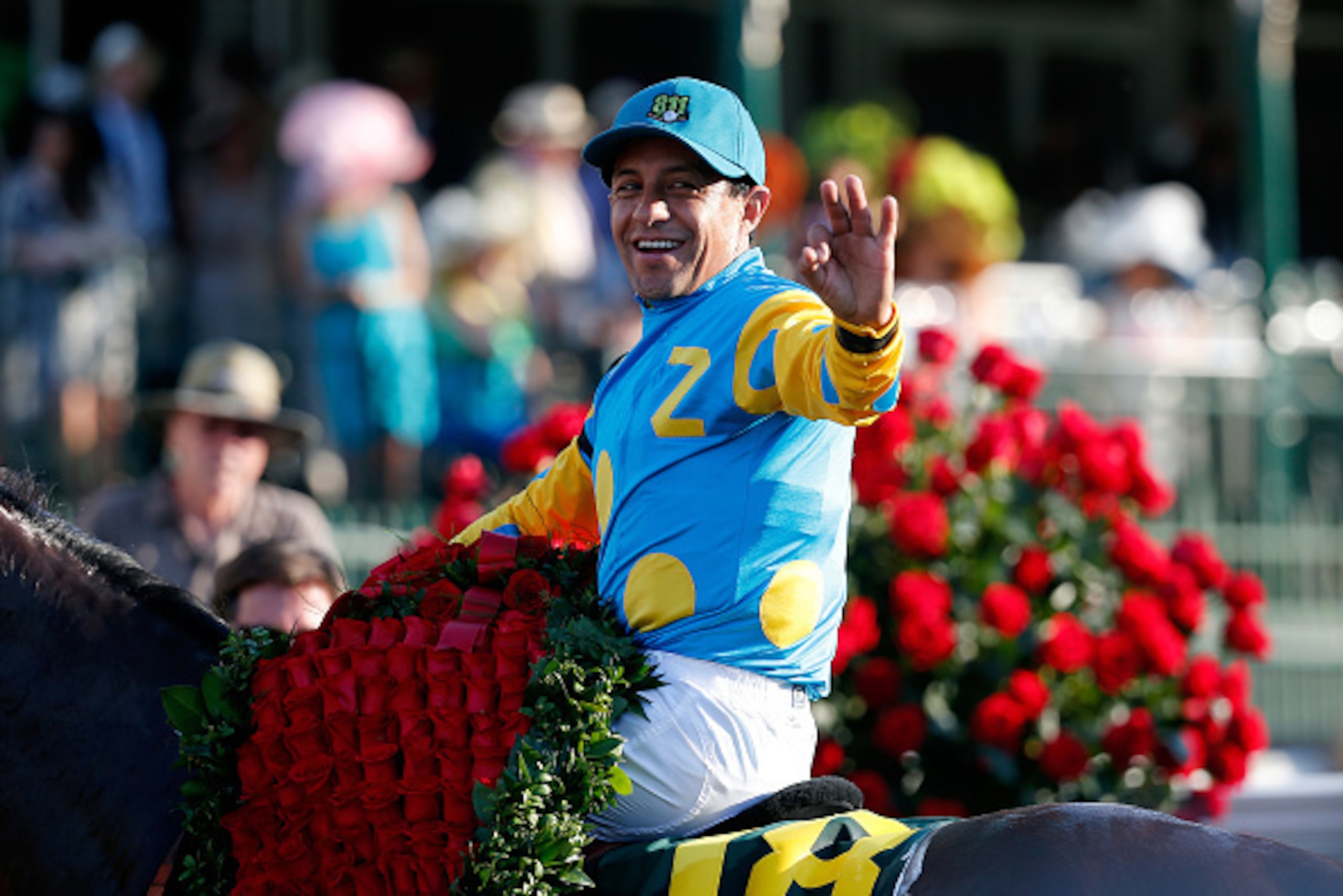 LOUISVILLE, KY - MAY 02:  Jockey Victor Espinoza celebrates atop of American Pharoah #18 in winners circle after winning the 141st running of the Kentucky Derby at Churchill Downs on May 2, 2015 in Louisville, Kentucky.  (Photo by Rob Carr/Getty Images)