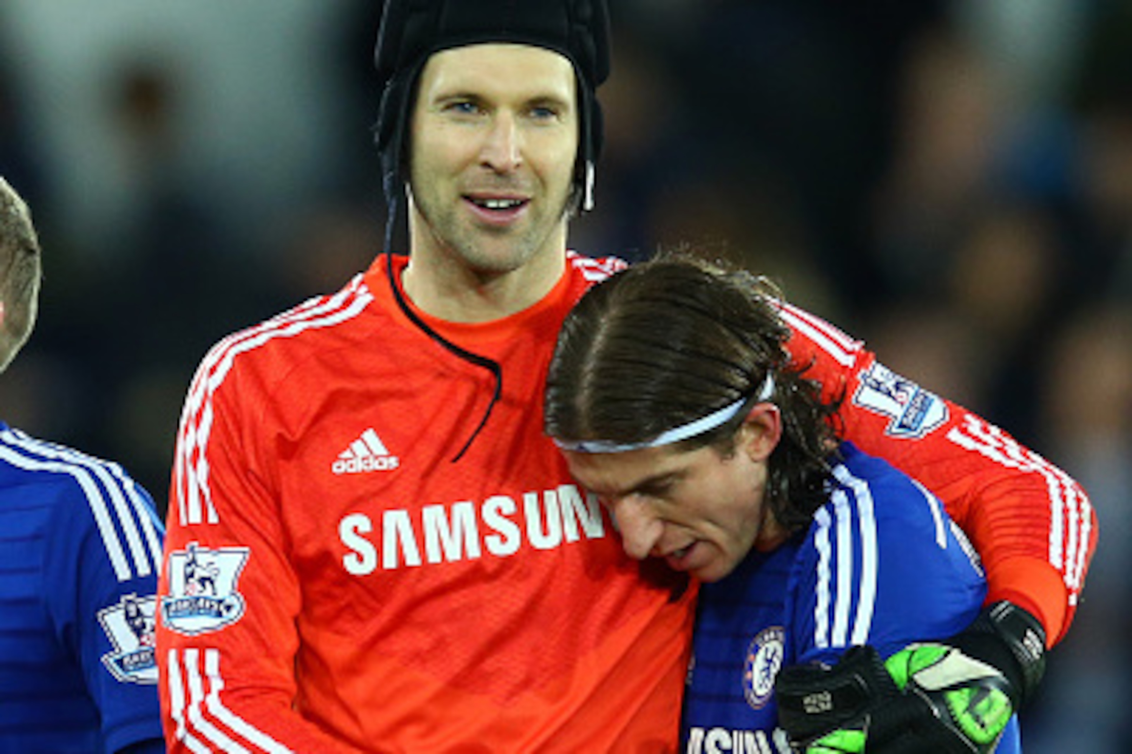 SWANSEA, WALES - JANUARY 17:  Filipe Luis of Chelsea (R) celebrates with Petr Cech of Chelsea after winning the Barclays Premier League match between Swansea City and Chelsea at Liberty Stadium on January 17, 2015 in Swansea, Wales.  (Photo by Richard Hea
