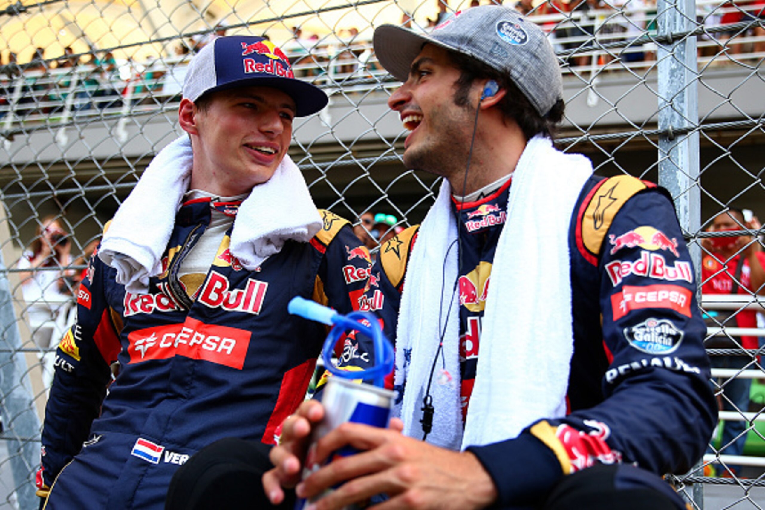 KUALA LUMPUR, MALAYSIA - MARCH 29: Max Verstappen of Netherlands and Scuderia Toro Rosso and Carlos Sainz of Spain and Scuderia Toro Rosso speak on the grid before the Malaysia Formula One Grand Prix at Sepang Circuit on March 29, 2015 in Kuala Lumpur, M KUALA LUMPUR, MALAYSIA - MARCH 29: Max Verstappen of Netherlands and Scuderia Toro Rosso and Carlos Sainz of Spain and Scuderia Toro Rosso speak on the grid before the Malaysia Formula One Grand Prix at Sepang Circuit on March 29, 2015 in Kuala Lumpur, M