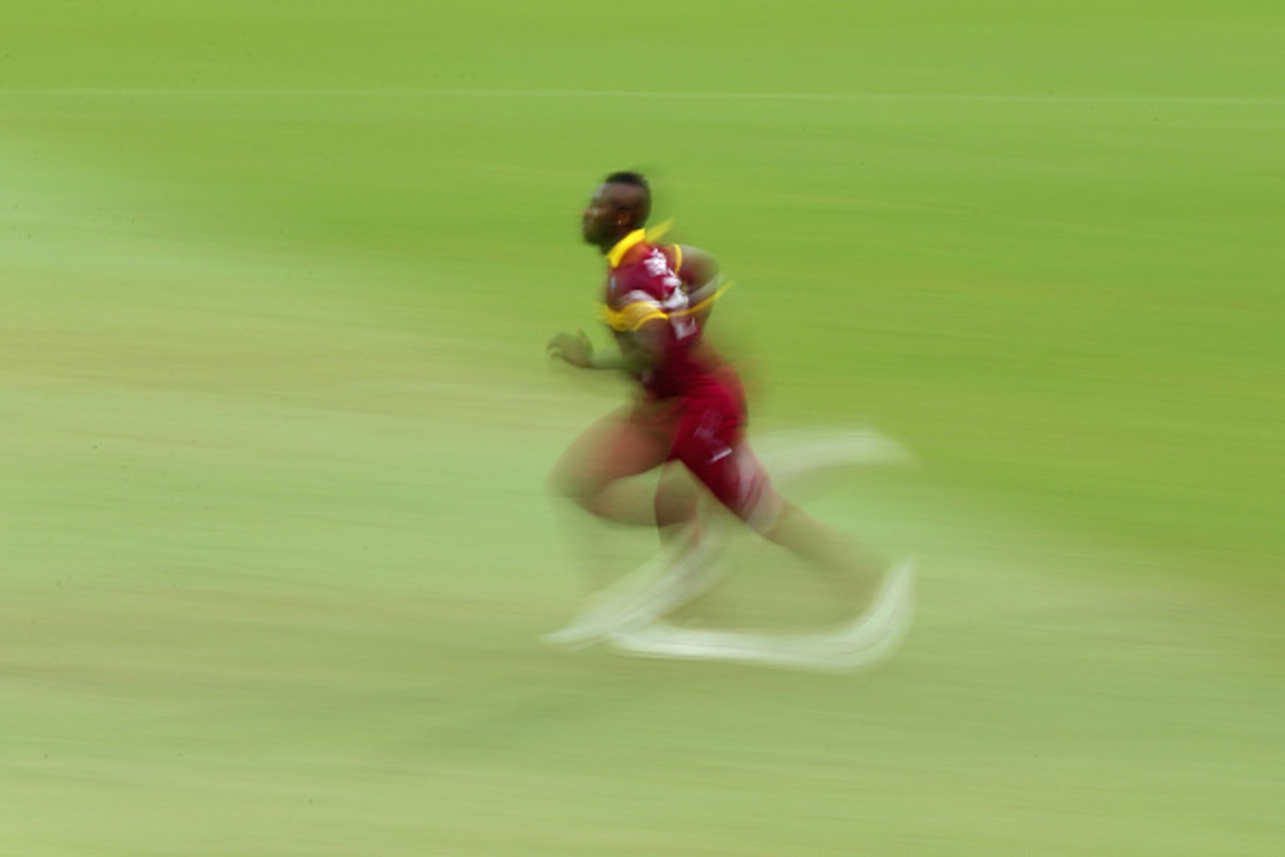 SYDNEY, AUSTRALIA - FEBRUARY 09:  Andre Russell of West Indies runs in to bowl during the ICC Cricket World Cup warm up match between England and the West Indies at Sydney Cricket Ground on February 9, 2015 in Sydney, Australia.  (Photo by Mark Kolbe/Gett