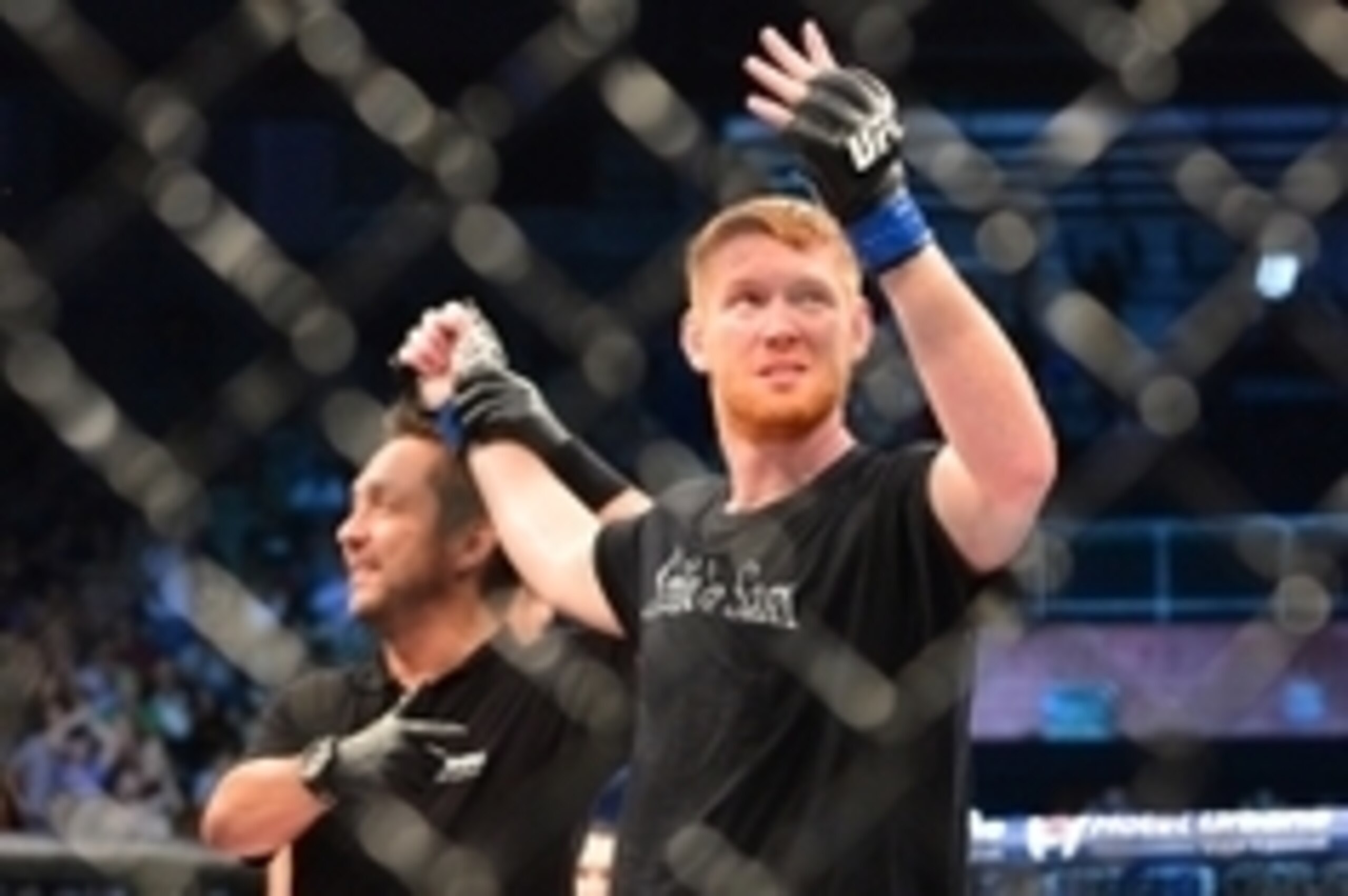 Feb 22, 2015; Porto Alegre, Brazil; Sam Alvey (blue gloves) reacts after his fight against Cezar Ferreira (red gloves) during UFC Fight Night at Ginasio do Gigantinho. Mandatory Credit: Jason da Silva-USA TODAY Sports