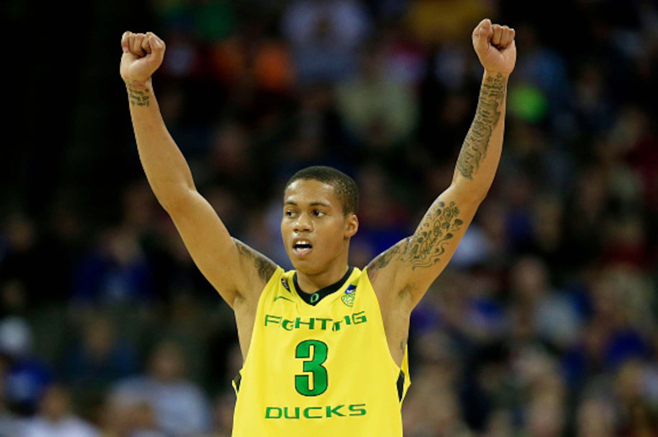 OMAHA, NE - MARCH 20:  Joseph Young #3 of the Oregon Ducks celebrates in the second half against the Oklahoma State Cowboys during the second round of the 2015 NCAA Men's Basketball Tournament at the CenturyLink Center on March 20, 2015 in Omaha, Nebraska