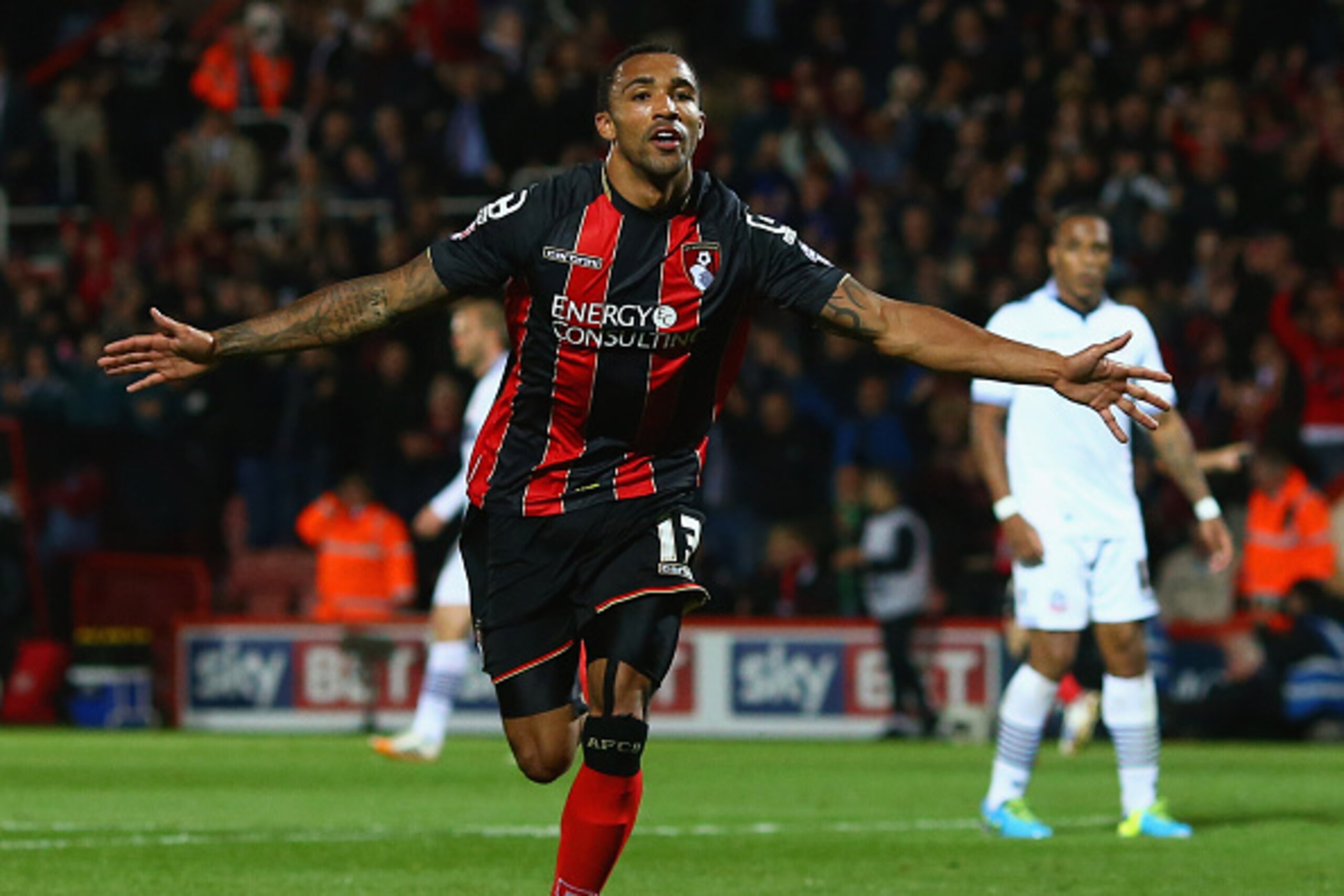 BOURNEMOUTH, ENGLAND - APRIL 27:  Callum Wilson of Bournemouth celebrates as he scores their third goal during the Sky Bet Championship match between AFC Bournemouth and Bolton Wanderers at Goldsands Stadium on April 27, 2015 in Bournemouth, England.  (Ph