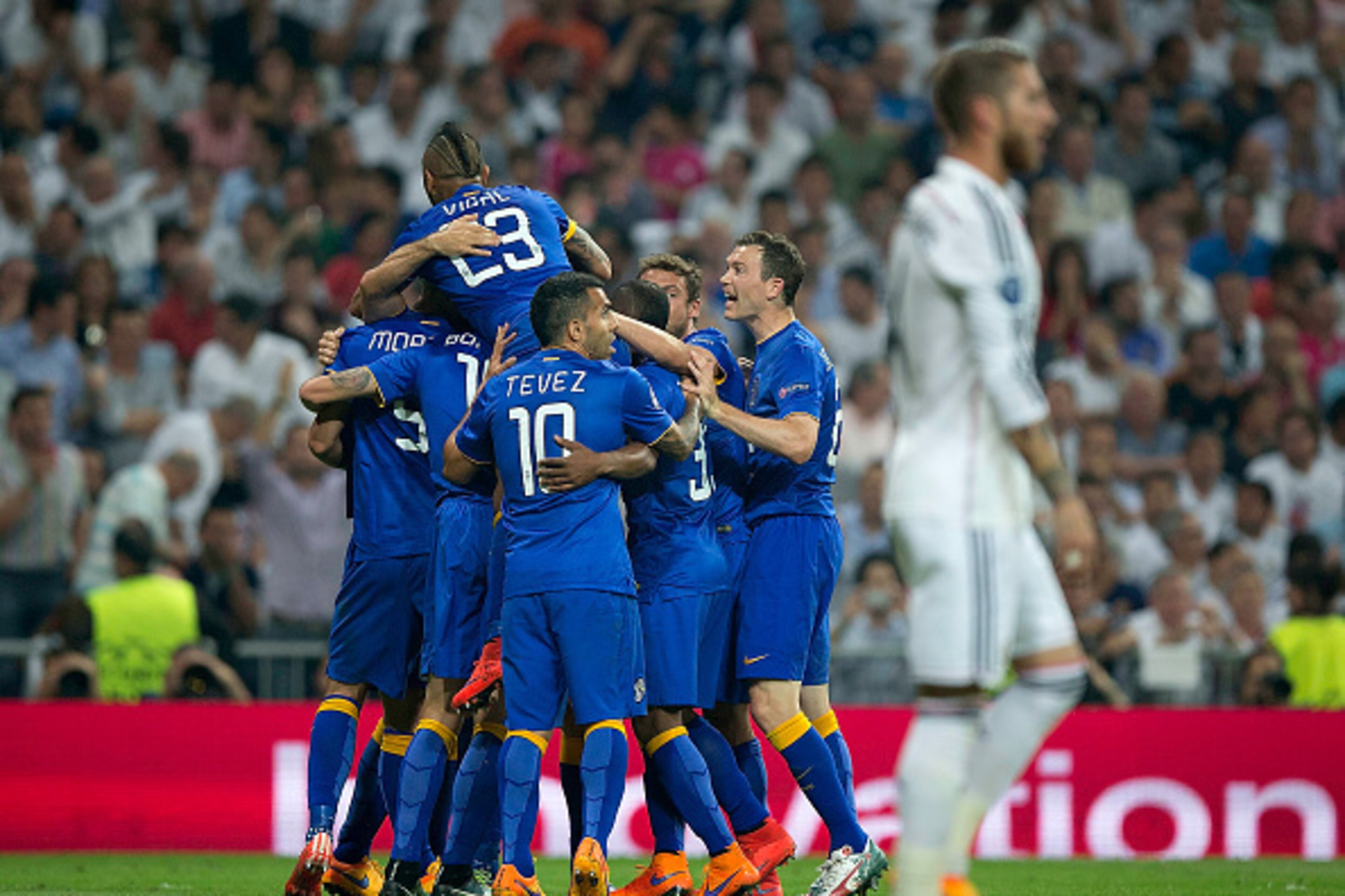 MADRID, SPAIN - MAY 13:  Alvaro Morata (L - Obscured) of Juventus is congratulated by teammates after scoring a goal to level the scores at 1-1 during the UEFA Champions League Semi Final, second leg match between Real Madrid and Juventus at Estadio Santi