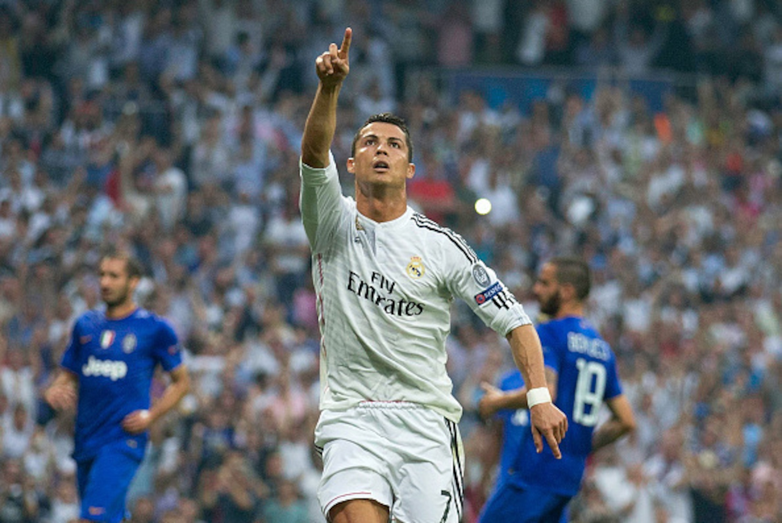 MADRID, SPAIN - MAY 13:  Cristiano Ronaldo of Real Madrid celebrates after scoring the opening goal from the penalty spot during the UEFA Champions League Semi Final, second leg match between Real Madrid and Juventus at Estadio Santiago Bernabeu on May 13