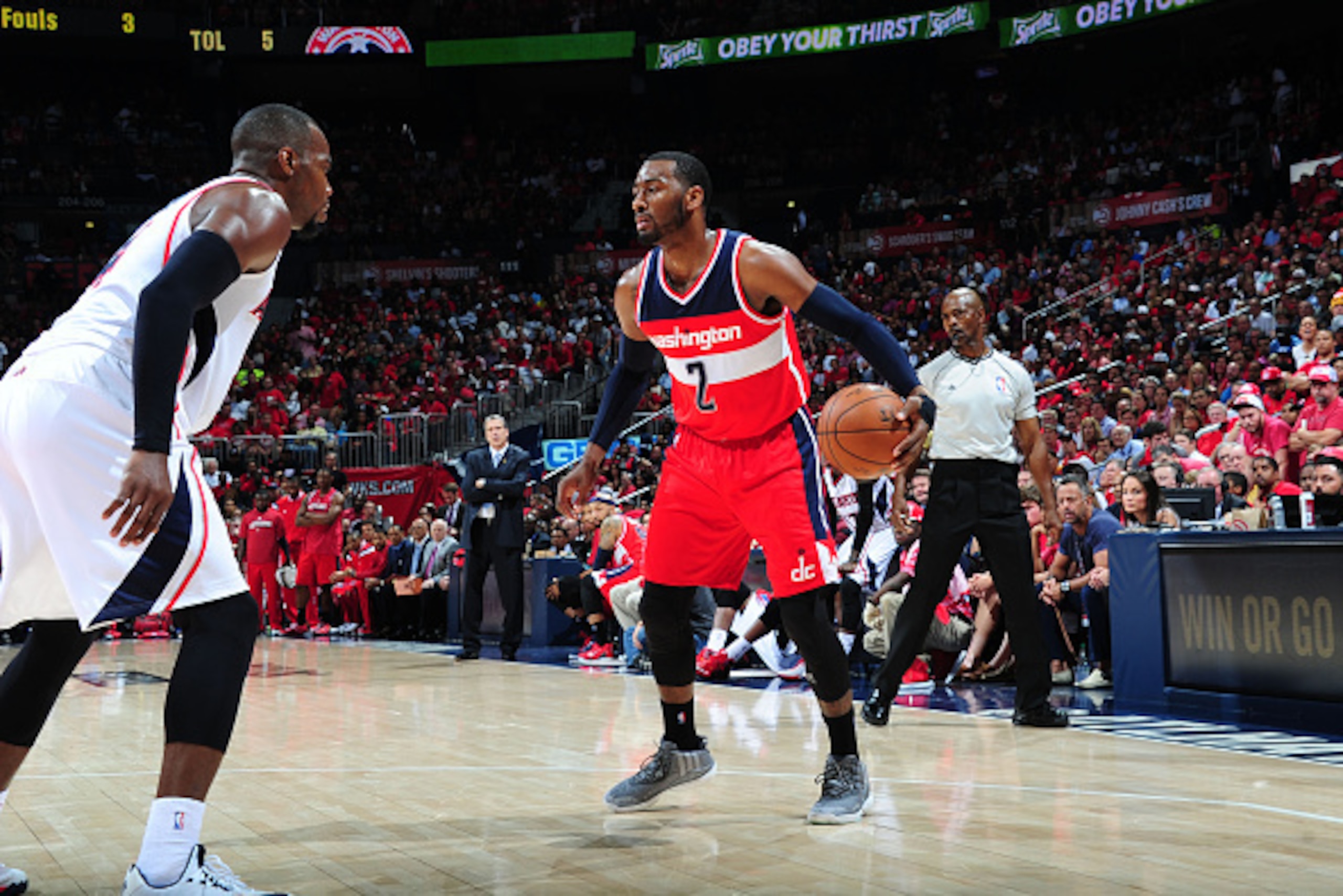 ATLANTA, GA - MAY 13: John Wall #2 of the Washington Wizards handles the ball against the Atlanta Hawks in Game Five of the Eastern Conference Semifinals during the 2015 NBA Playoffs on May 13, 2015 at the Philips Arena in Atlanta, Georgia. NOTE TO USER ATLANTA, GA - MAY 13: John Wall #2 of the Washington Wizards handles the ball against the Atlanta Hawks in Game Five of the Eastern Conference Semifinals during the 2015 NBA Playoffs on May 13, 2015 at the Philips Arena in Atlanta, Georgia. NOTE TO USER