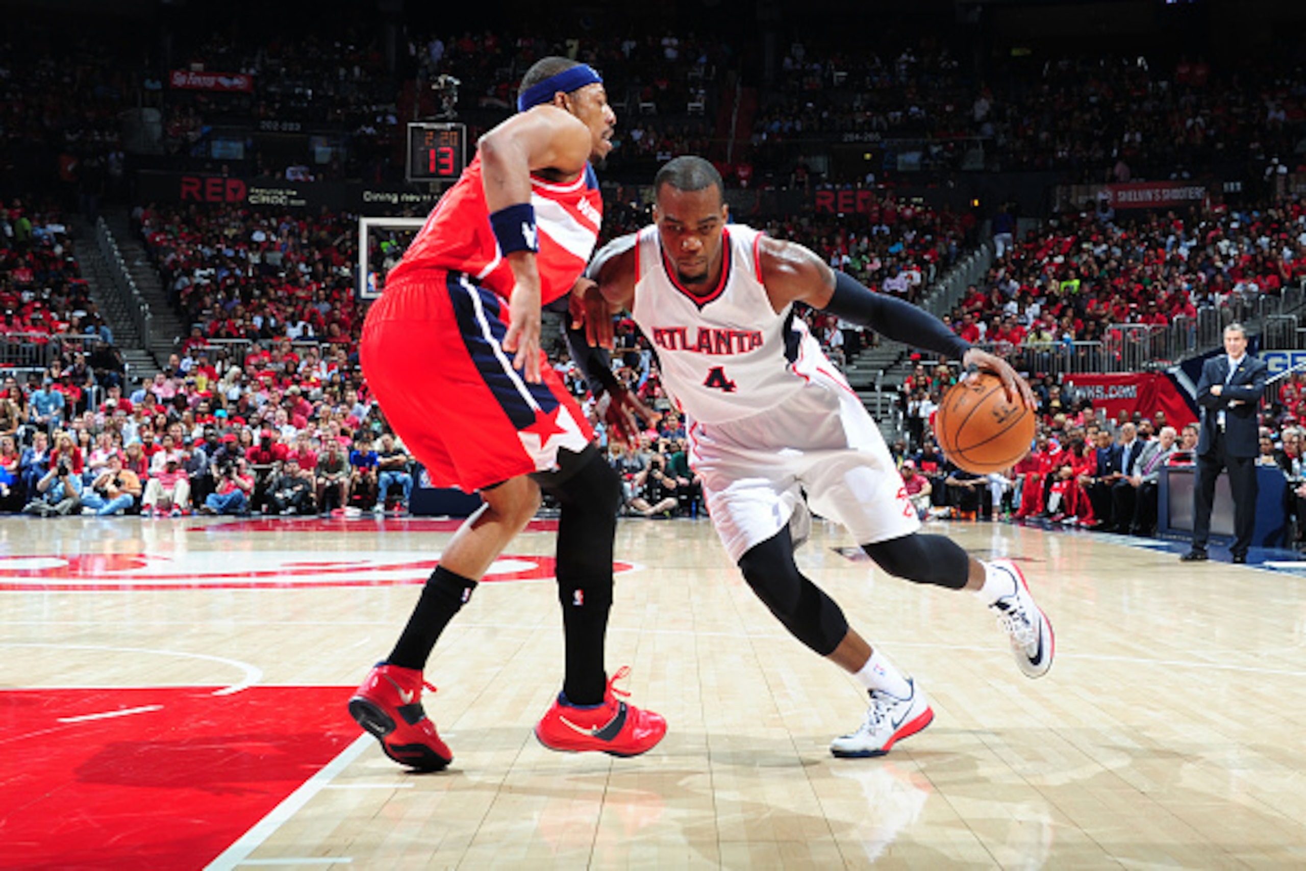 ATLANTA, GA - MAY 13: Paul Millsap #4 of the Atlanta Hawks drives to the basket against Paul Pierce #34 of the Washington Wizards in Game Five of the Eastern Conference Semifinals during the 2015 NBA Playoffs on May 13, 2015 at the Philips Arena in Atlan ATLANTA, GA - MAY 13: Paul Millsap #4 of the Atlanta Hawks drives to the basket against Paul Pierce #34 of the Washington Wizards in Game Five of the Eastern Conference Semifinals during the 2015 NBA Playoffs on May 13, 2015 at the Philips Arena in Atlan