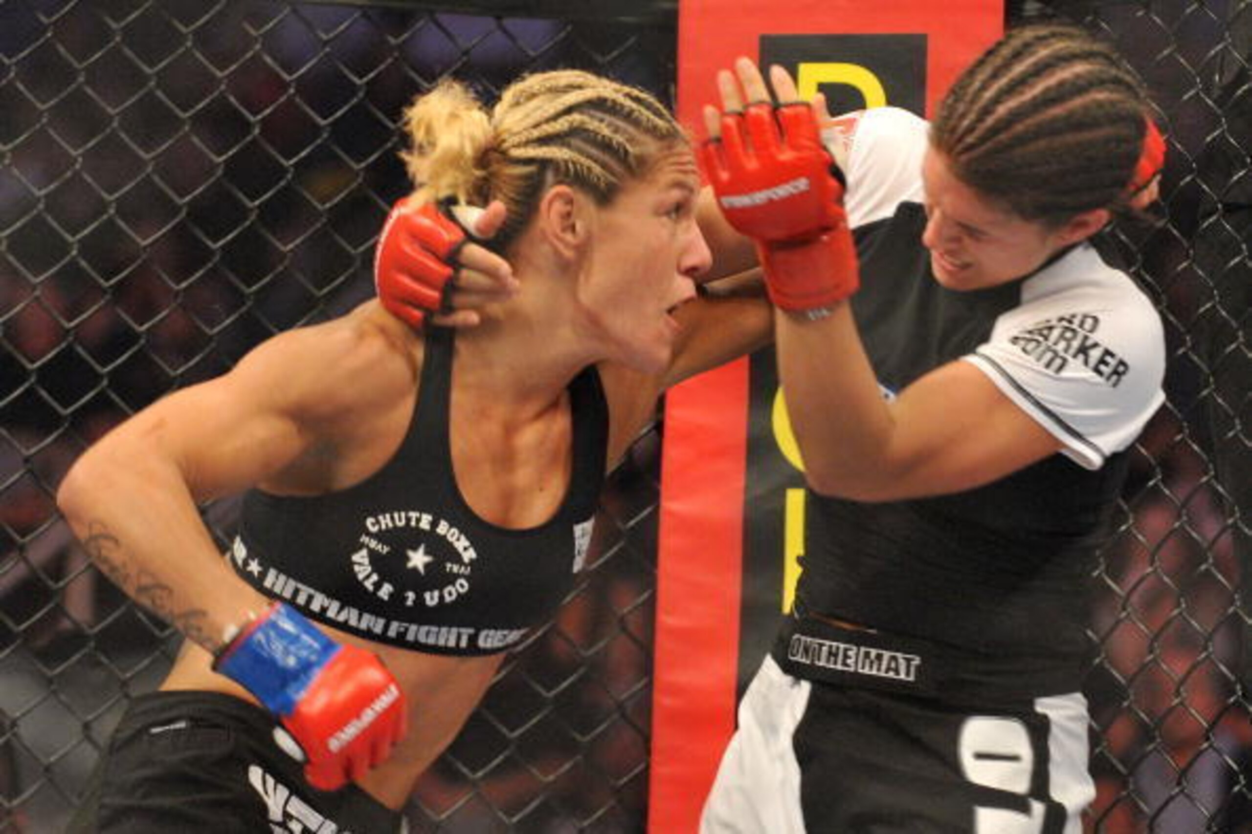 SAN JOSE, CA - AUGUST 15:  Cris Cyborg (L) battles Gina Carano during their Middleweight Championship fight at Stikeforce: Carano vs. Cyborg on August 15, 2009 in San Jose, California.  (Photo by Jon Kopaloff/Getty Images)