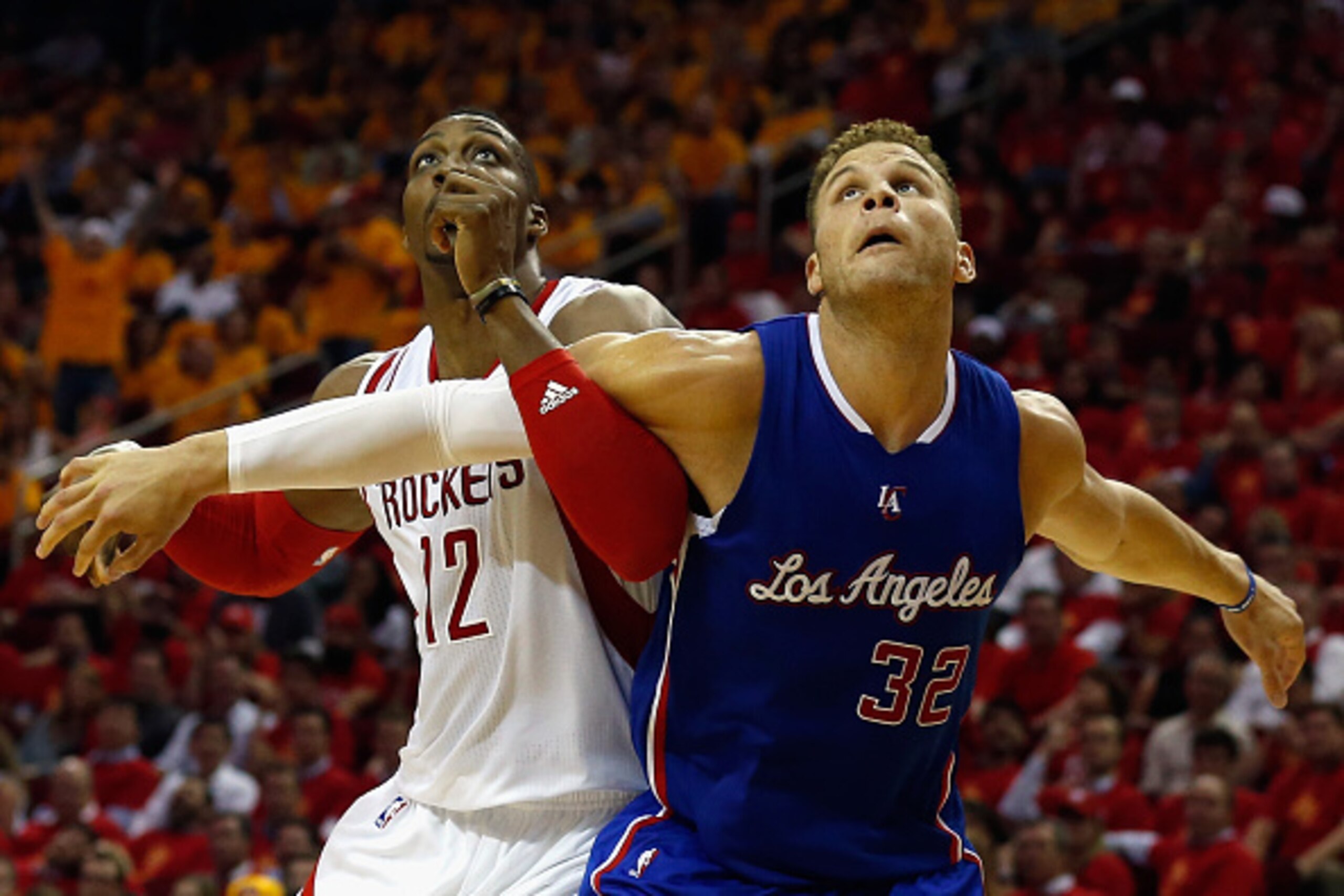HOUSTON, TX - MAY 12:  Dwight Howard #12 of the Houston Rockets fights for a rebound with Blake Griffin #32 of the Los Angeles Clippers during Game Five of the Western Conference Semifinals at the Toyota Center for the 2015 NBA Playoffs on May 12, 2015 in