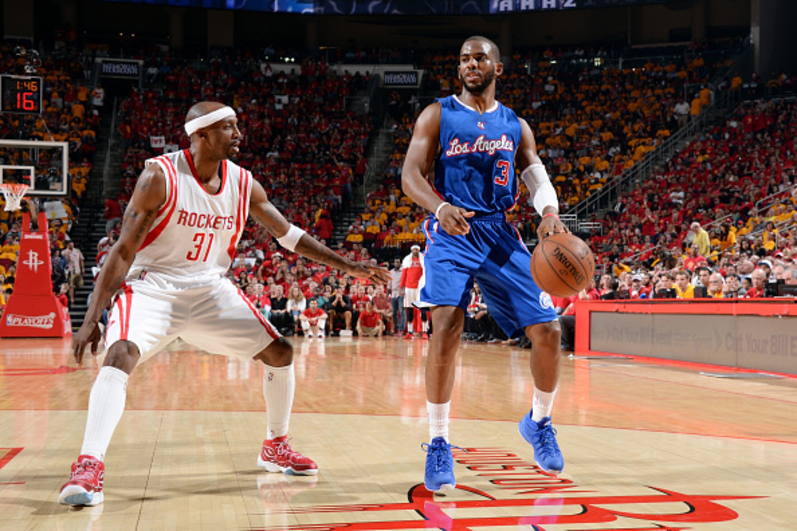 HOUSTON, TX - MAY 12: Chris Paul #3 of the Los Angeles Clippers handles the ball against Jason Terry #31 of the Houston Rockets in Game Five of the Western Conference Semifinals during the 2015 NBA Playoffs on May 12, 2015 at the Toyota Center in Houston,