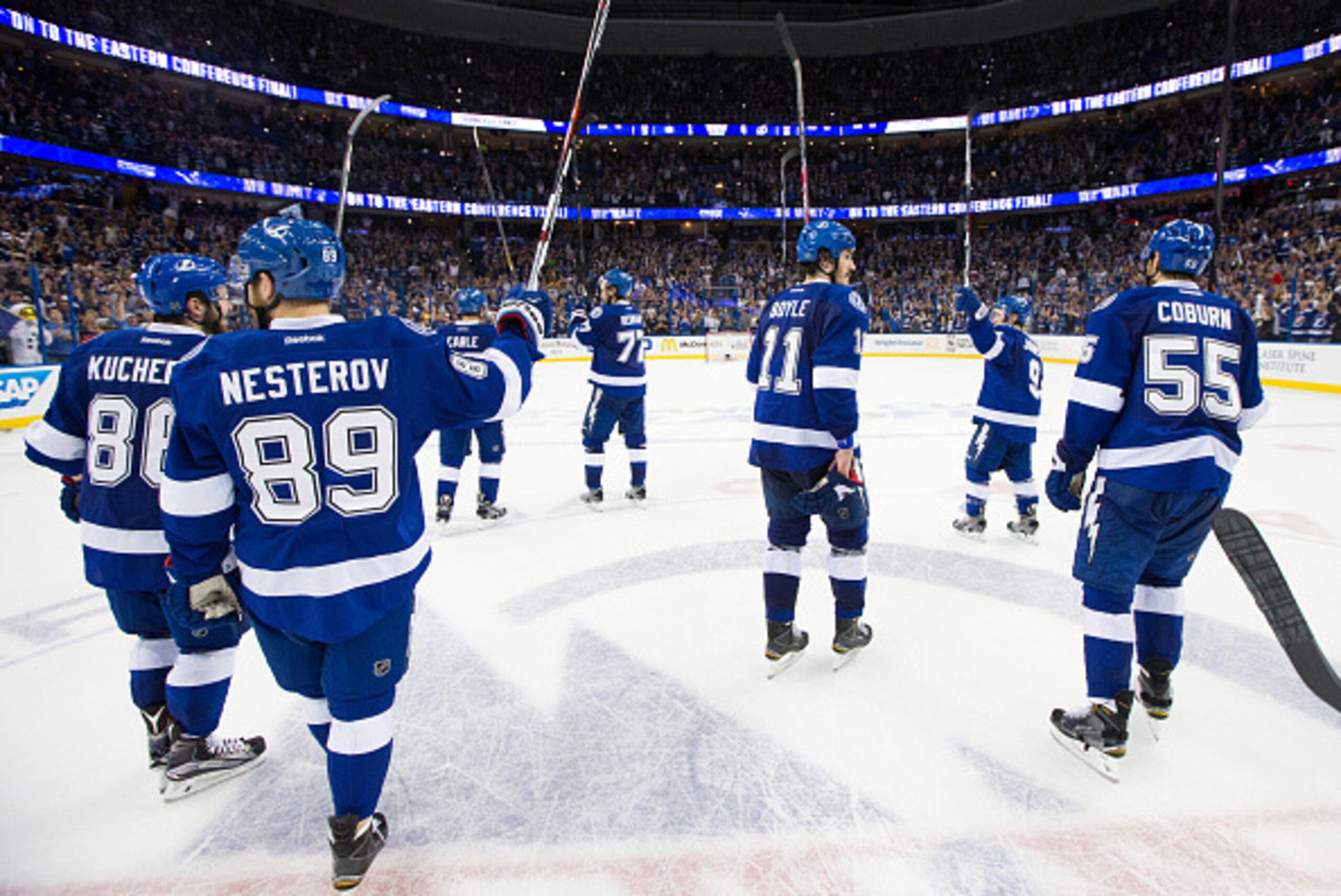 TAMPA, FL - May 12: The Tampa Bay Lightning celebrate the series win against the Montreal Canadiens after Game Six of the Eastern Conference Semifinals during the 2015 NHL Stanley Cup Playoffs at the Amalie Arena on May 12, 2015 in Tampa, Florida.  (Photo
