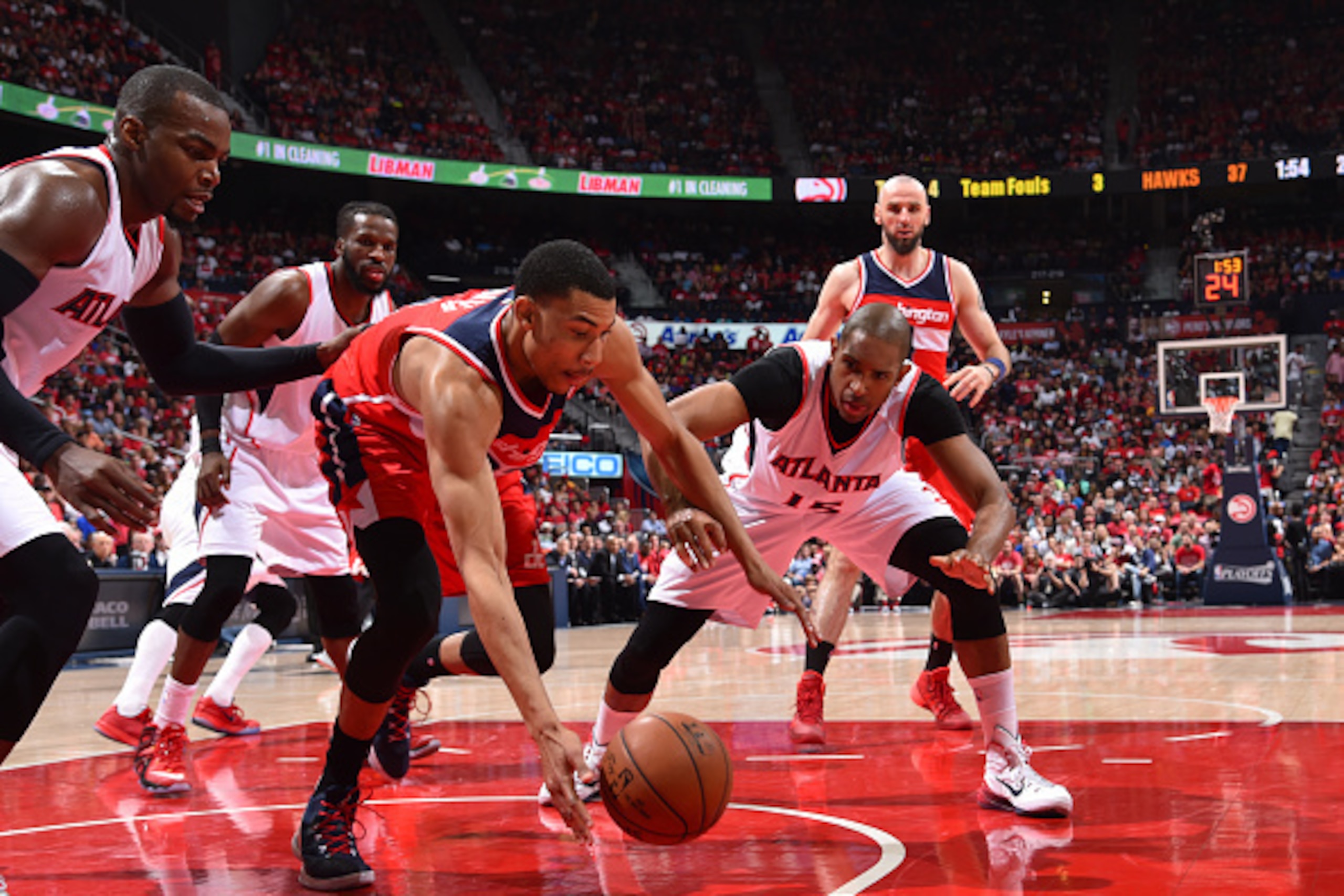 ATLANTA, GA: Otto Porter Jr. #22 of the Washington Wizards goes after the loose the ball against the Atlanta Hawks in Game five of the Eastern Conference Semifinals of the NBA Playoffs on May 13, 2015 at Philips Arena in Atlanta, Georgia. NOTE TO USER: U ATLANTA, GA: Otto Porter Jr. #22 of the Washington Wizards goes after the loose the ball against the Atlanta Hawks in Game five of the Eastern Conference Semifinals of the NBA Playoffs on May 13, 2015 at Philips Arena in Atlanta, Georgia. NOTE TO USER: U