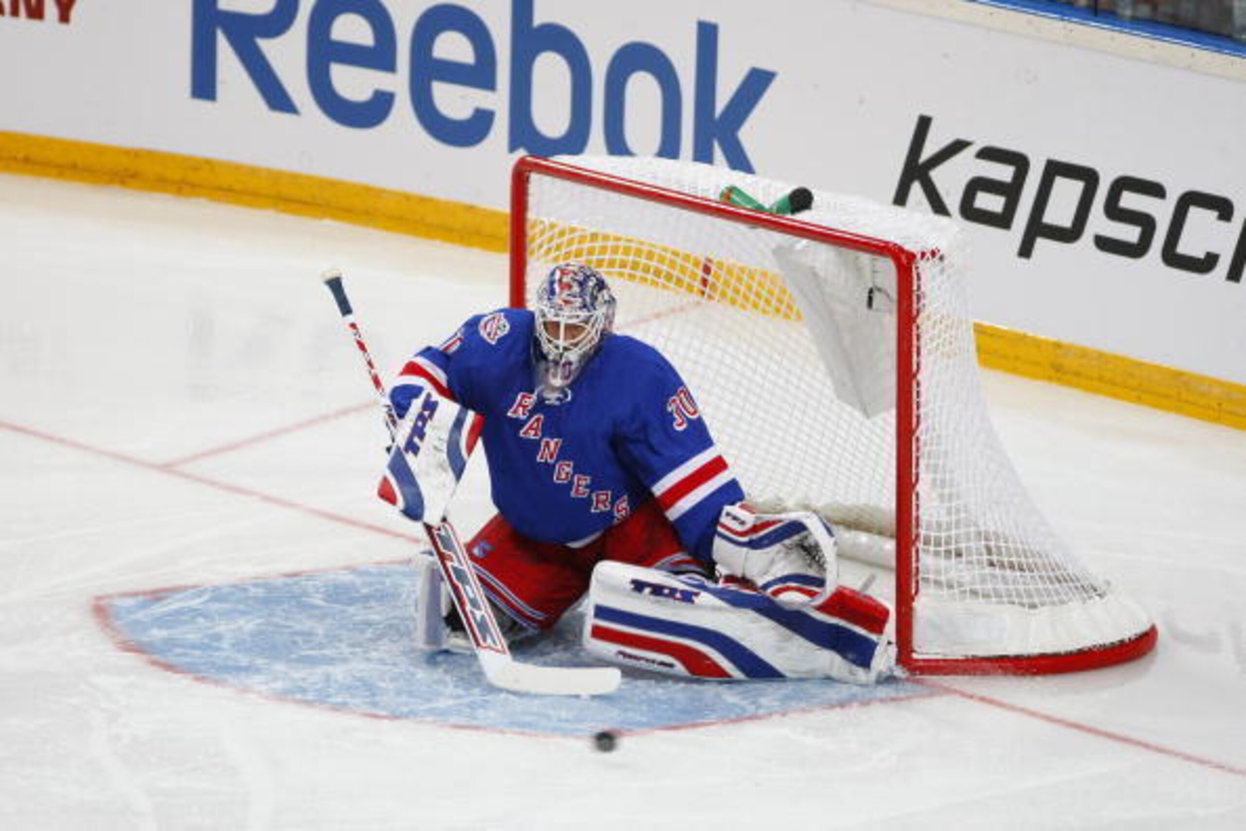 PRAGUE, CZECH REPUBLIC - OCTOBER 5: Henrik Lundvist #30 of the New York Rangers makes a save in the Bridgestone NHL Premiere Prague game against the Tampa Bay Lightning at O2 Arena in Prague, Czech Republic on October 5, 2008. The Rangers won 2-1. (Photo 