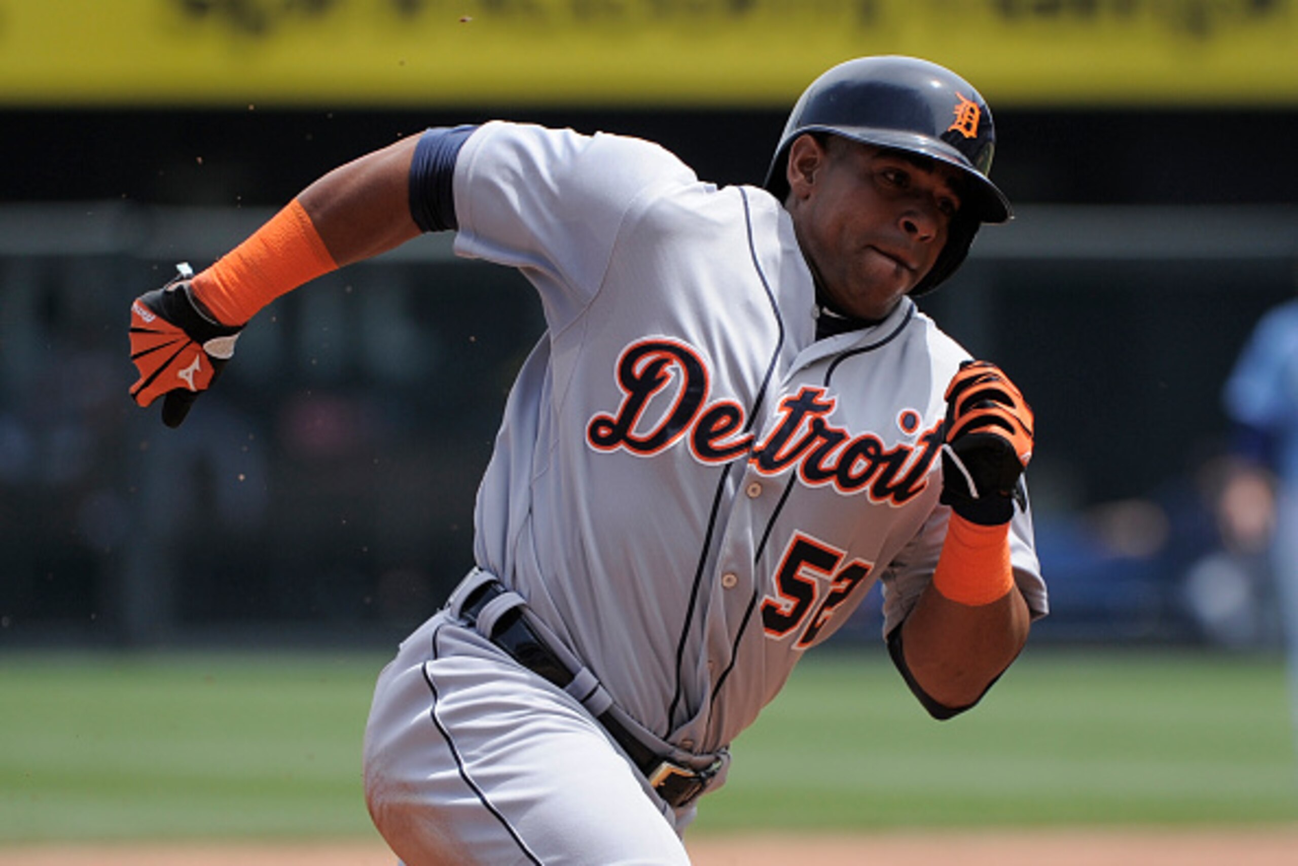 KANSAS CITY, MO - MAY 3:  Yoenis Cespedes #52 of the Detroit Tigers rounds third as he heads home to score on an Alex Avila single in the second inning against the Kansas City Royals on May 3, 2015 at Kauffman Stadium in Kansas City, Missouri. (Photo by E