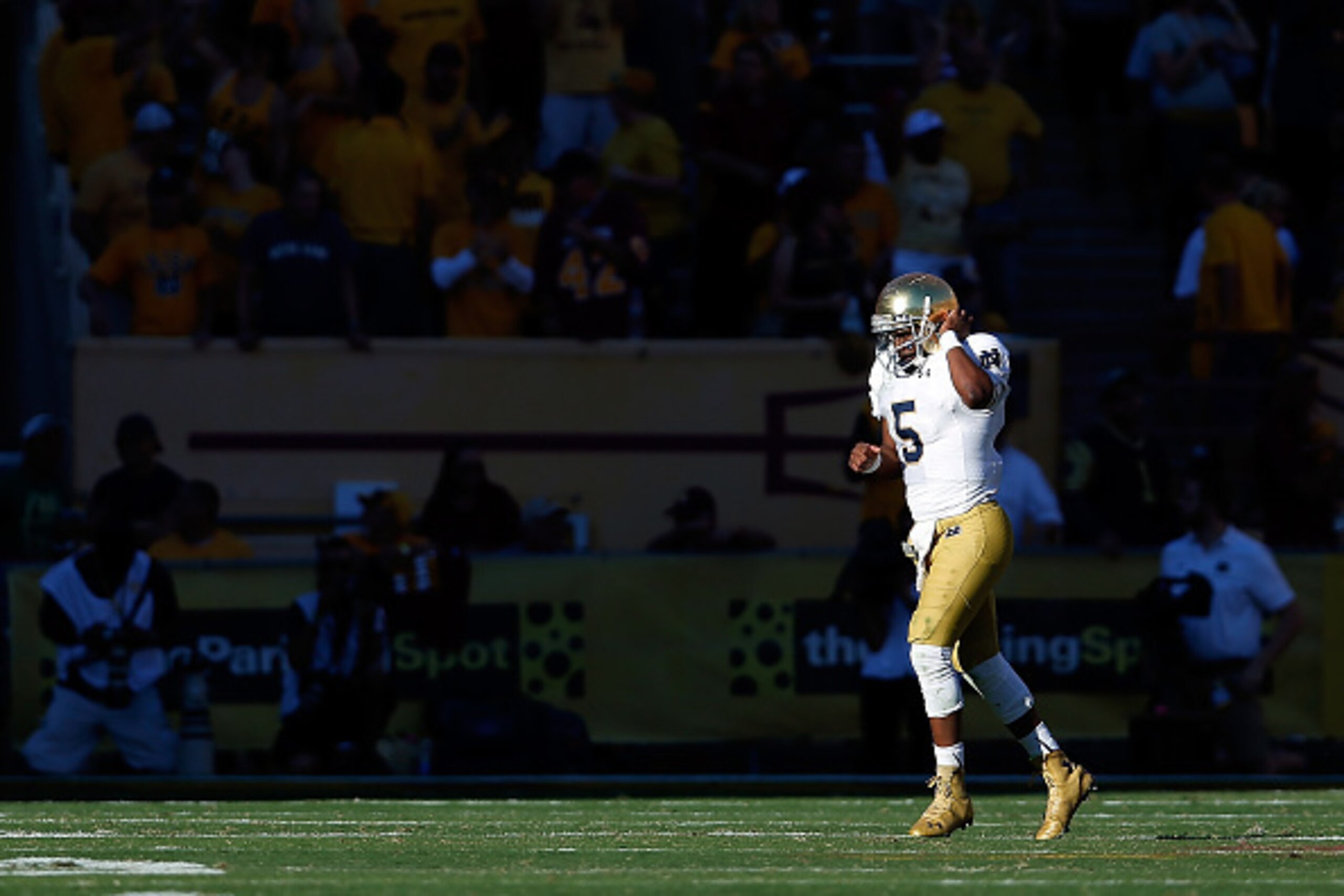 TEMPE, AZ - NOVEMBER 08: Quarterback Everett Golson #5 of the Notre Dame Fighting Irish walks off the field after throwing an interception during the third quarter of the college football game against the Arizona State Sun Devils at Sun Devil Stadium on TEMPE, AZ - NOVEMBER 08: Quarterback Everett Golson #5 of the Notre Dame Fighting Irish walks off the field after throwing an interception during the third quarter of the college football game against the Arizona State Sun Devils at Sun Devil Stadium on