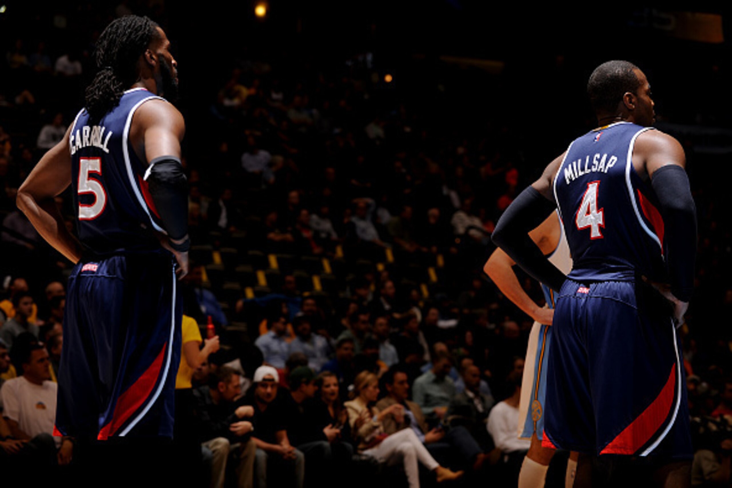 DENVER, CO - MARCH 11:  DeMarre Carroll #5 and Paul Millsap #4 of the Atlanta Hawks during the game against the Denver Nuggets on March 11, 2015 at the Pepsi Center in Denver, Colorado. NOTE TO USER: User expressly acknowledges and agrees that, by downloa