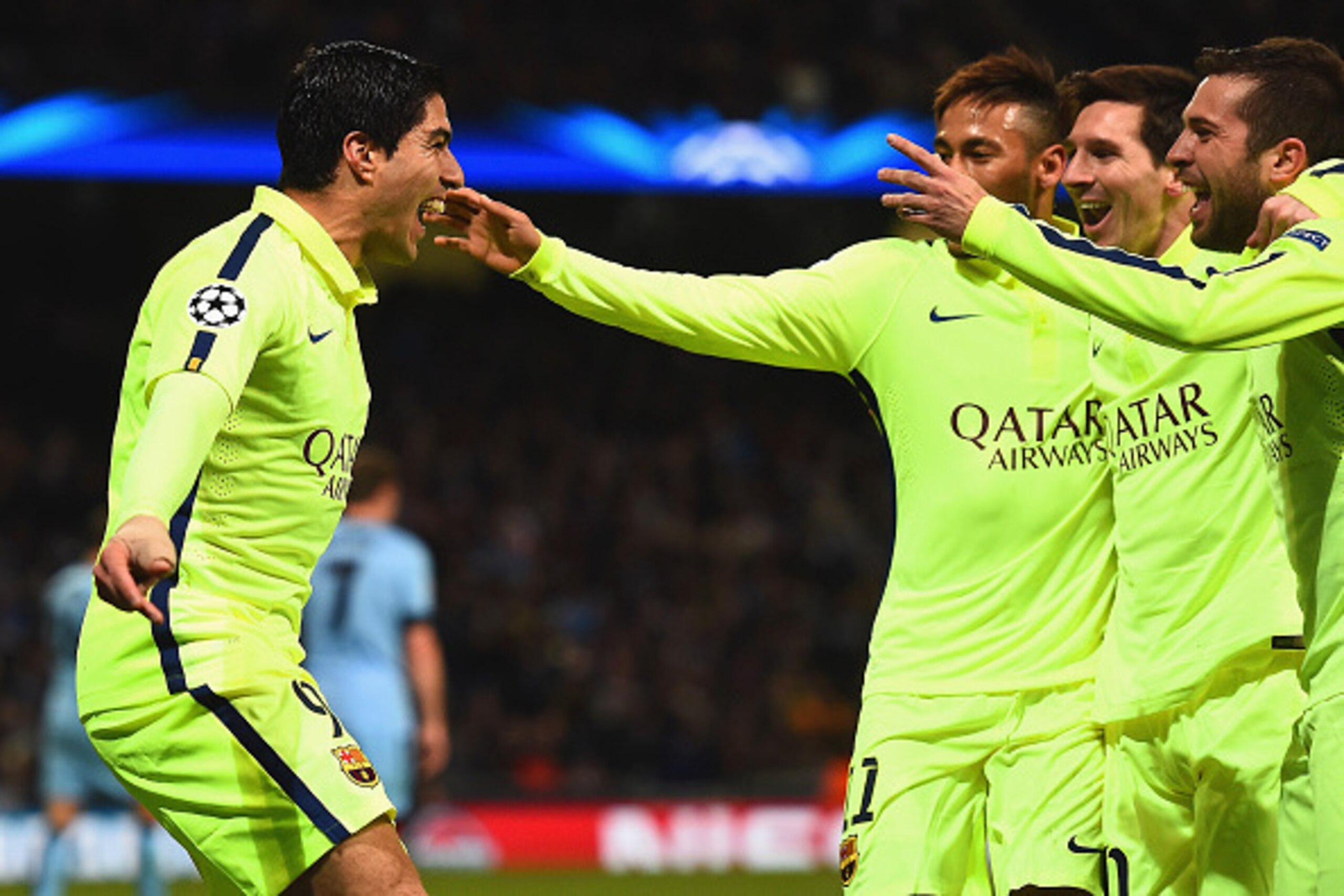 MANCHESTER, ENGLAND - FEBRUARY 24:  Luis Suarez of Barcelona (L) celebrates scoring their second goal with team mates during the UEFA Champions League Round of 16 match between Manchester City and Barcelona at Etihad Stadium on February 24, 2015 in Manche