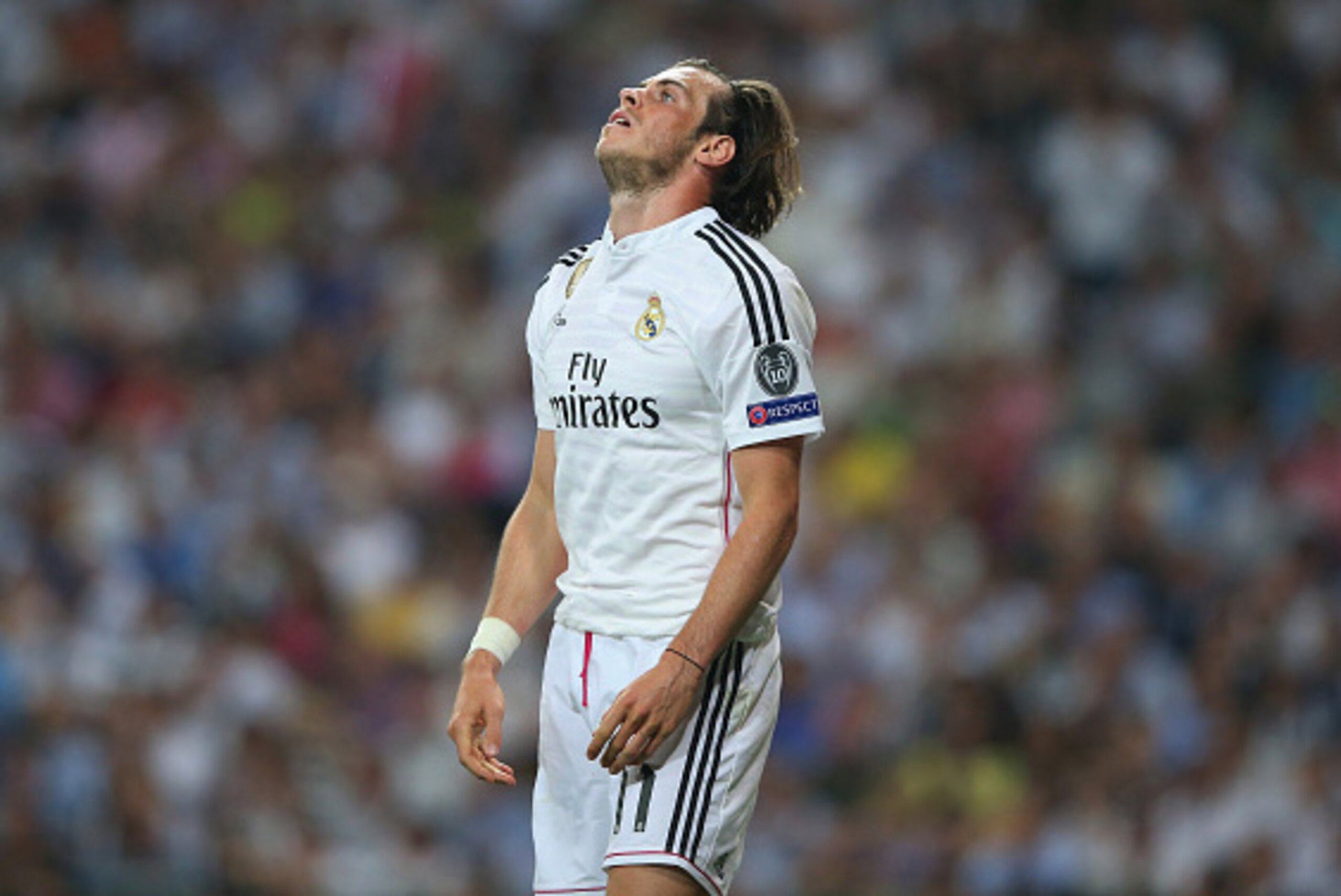MADRID, SPAIN - MAY 13:  A dejected Gareth Bale of Real Madrid reacts following his team's exit from the competition during the UEFA Champions League Semi Final, second leg match between Real Madrid and Juventus at Estadio Santiago Bernabeu on May 13, 201