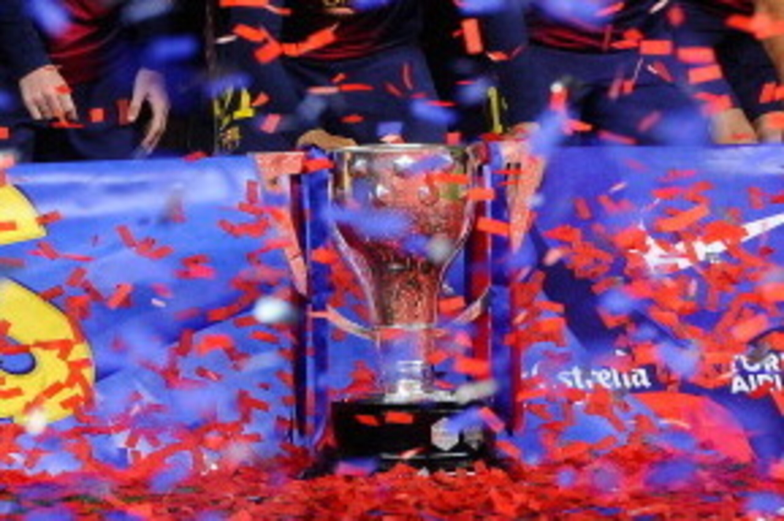 BARCELONA, SPAIN - MAY 19:  FC Barcelona players pose with the trophy during the celebration after winning the Spanish League after the La Liga match between FC Barcelona and Real Valladolid CF at Camp Nou on May 19, 2013 in Barcelona, Spain.  (Photo by D