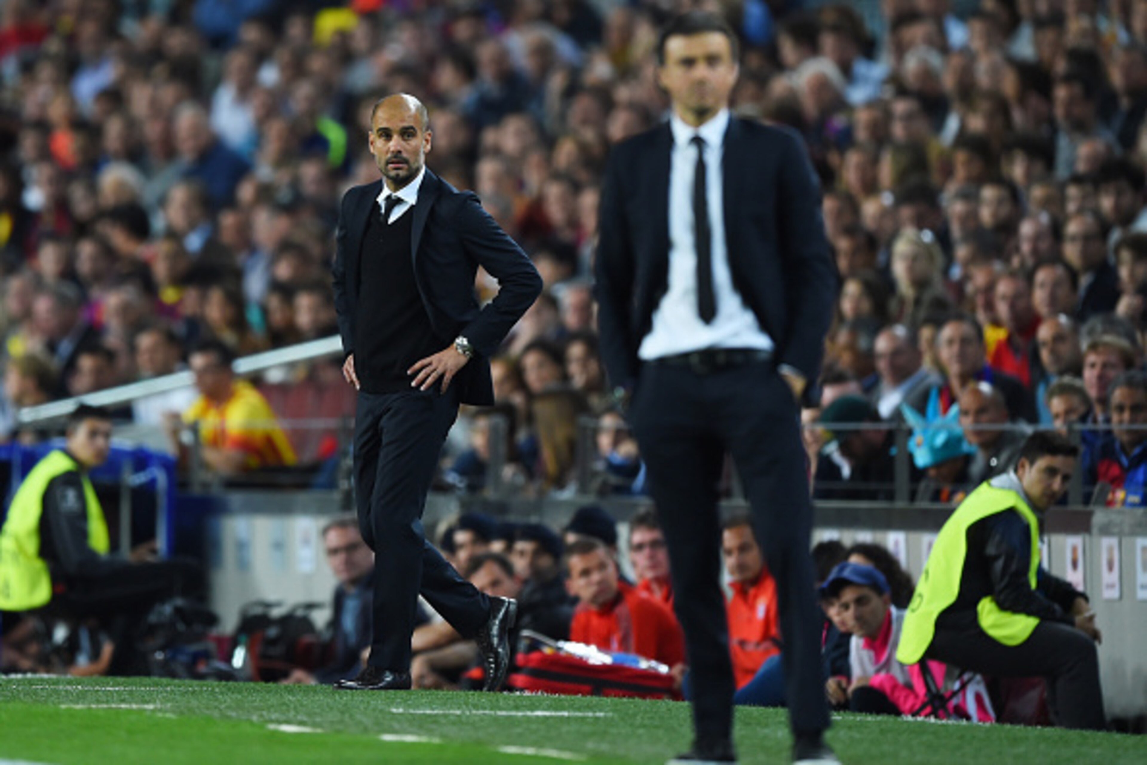 BARCELONA, SPAIN - MAY 06:  A dejected Josep Guardiola the head coach of Bayern Muenchen looks on past Luis Enrique the head coach of Barcelona during the UEFA Champions League Semi Final, first leg match between FC Barcelona and FC Bayern Muenchen at Cam