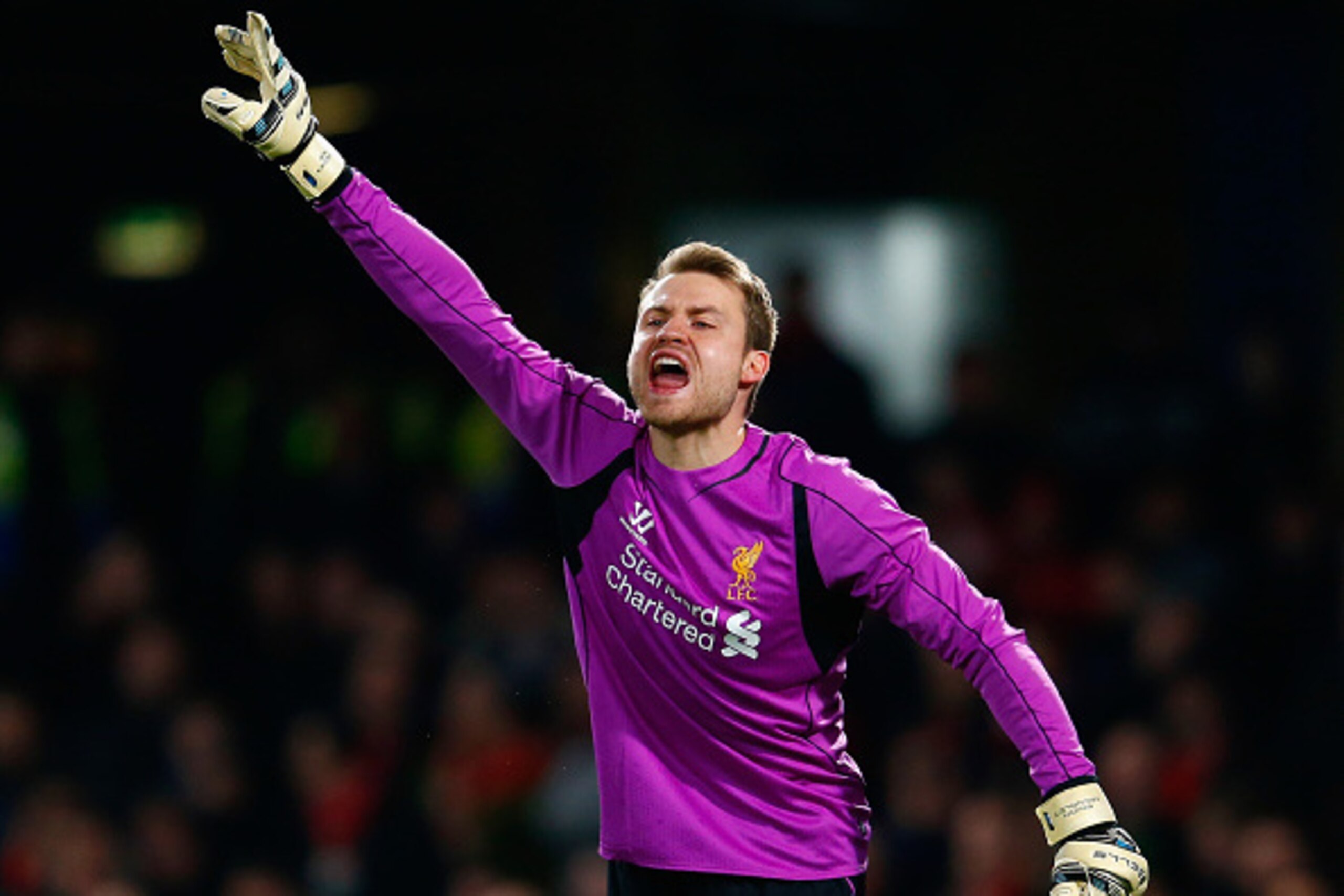 LONDON, ENGLAND - JANUARY 27:  Simon Mignolet of Liverpool shouts instructions during the Capital One Cup Semi-Final second leg between Chelsea and Liverpool at Stamford Bridge on January 27, 2015 in London, England.  (Photo by Julian Finney/Getty Images)