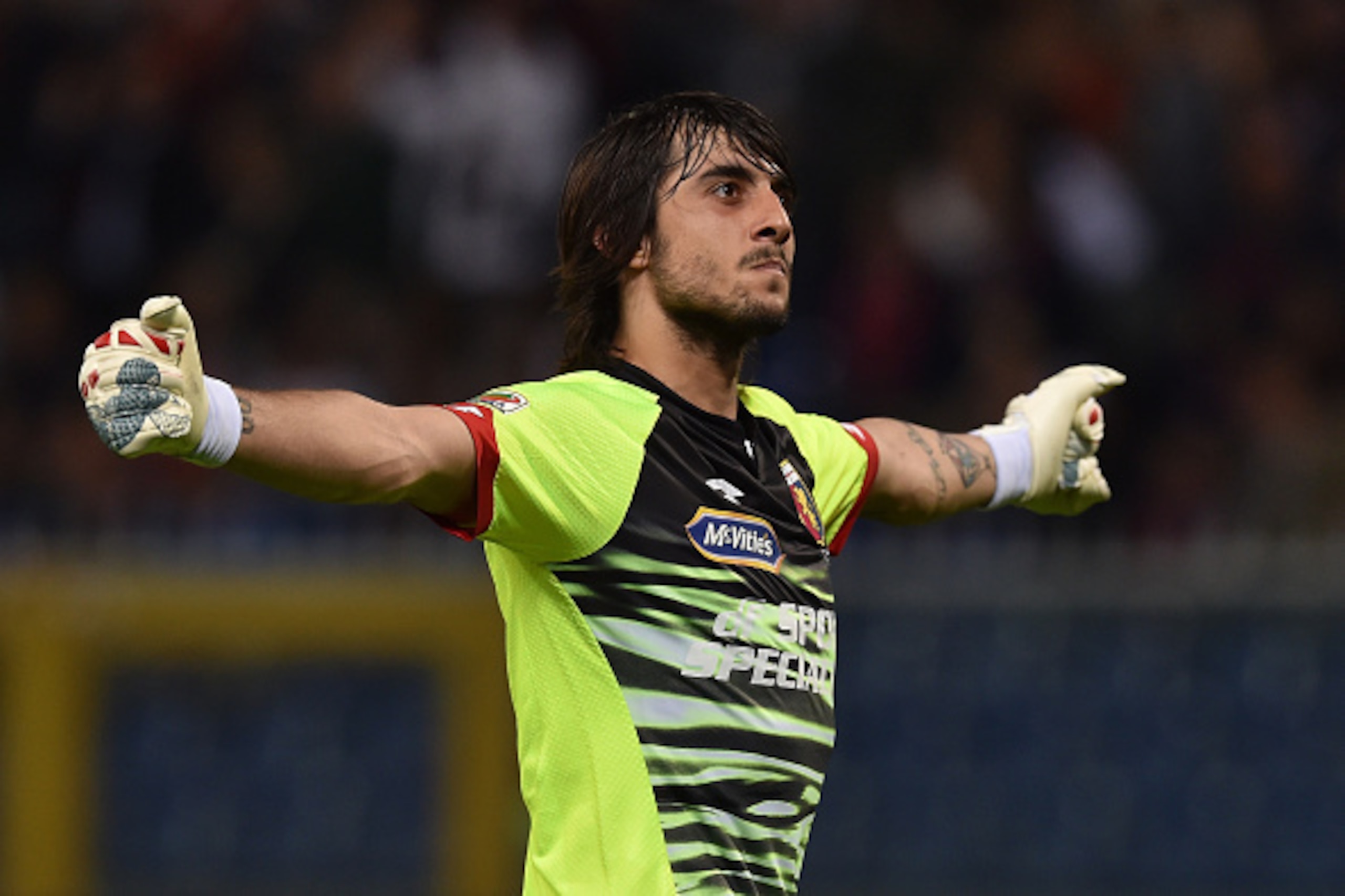 GENOA, ITALY - MAY 11:  Mattia Perin of Genoa CFC celebrates after his team-mate Iago Falque Silva scored the opening goal during the Serie A match between Genoa CFC and Torino FC at Stadio Luigi Ferraris on May 11, 2015 in Genoa, Italy.  (Photo by Valeri