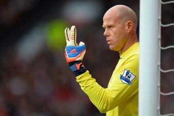 MANCHESTER, ENGLAND - SEPTEMBER 29:  Brad Friedel of Tottenham Hotspur directs his defence during the Barclays Premier League match between Manchester United and Tottenham Hotspur at Old Trafford on September 29, 2012 in Manchester, England.  (Photo by Sh