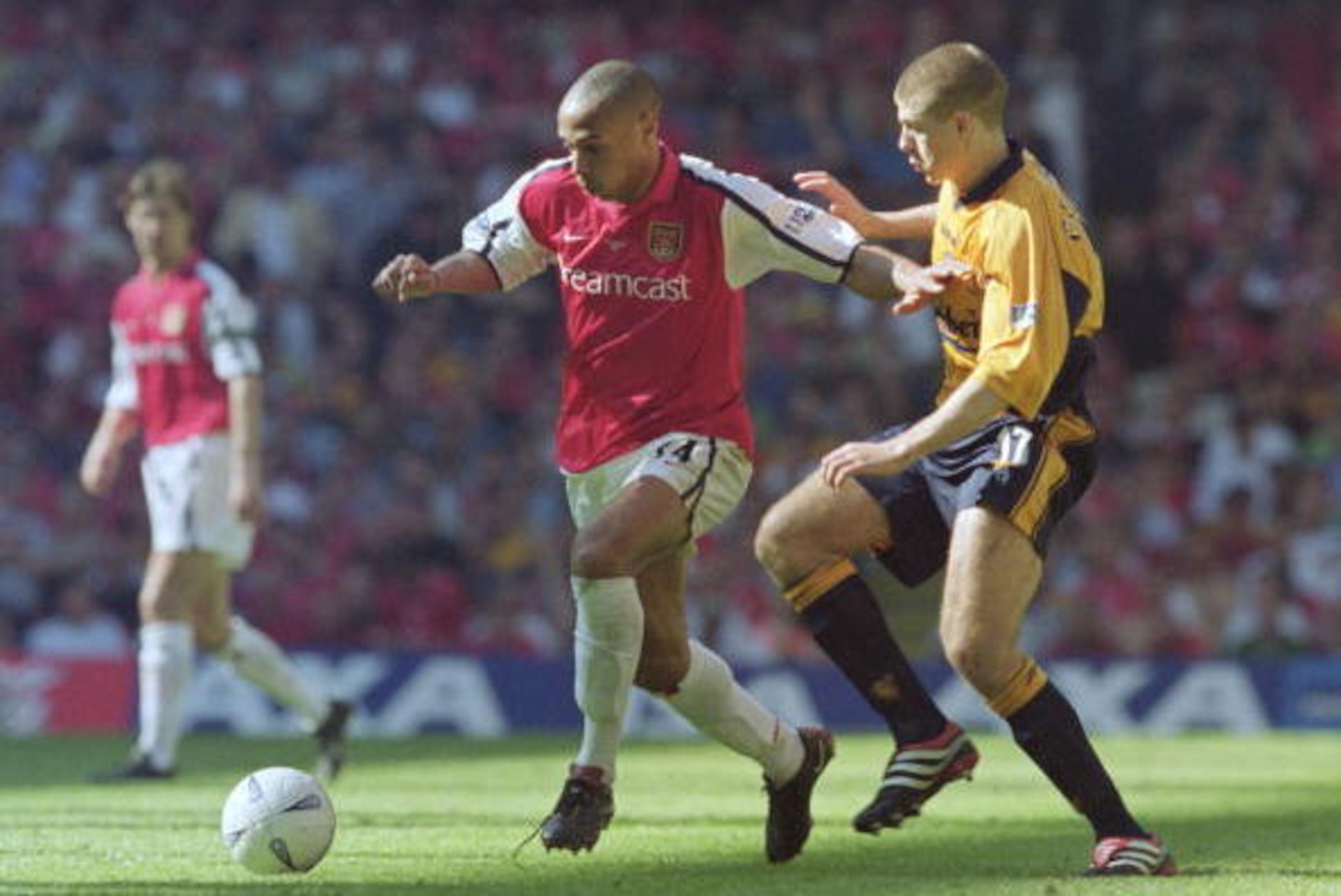 12 May 2001:  Thierry Henry of Arsenal holds off Steven Gerrard of Liverpool during the AXA Sponsored FA Cup Final at the Millennium Stadium in Cardiff, Wales. Liverpool won 2-1. \ Mandatory Credit: Clive Brunskill /Allsport