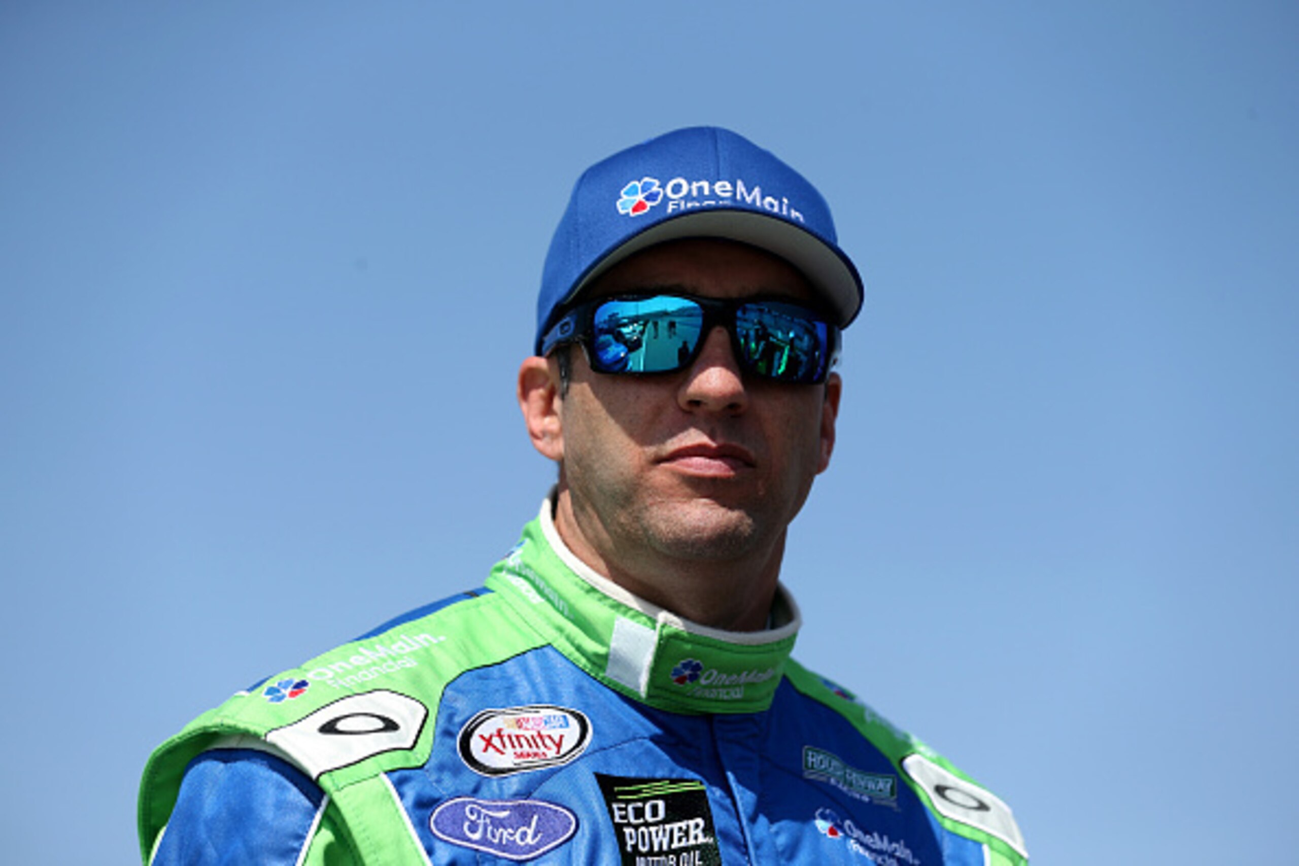RICHMOND, VA - APRIL 24:  Elliott Sadler, driver of the #1 OneMain Financial Ford, stands on the grid during qualifying for the NASCAR XFINITY Series ToyotaCare 250 at Richmond International Raceway on April 24, 2015 in Richmond, Virginia.  (Photo by Stre