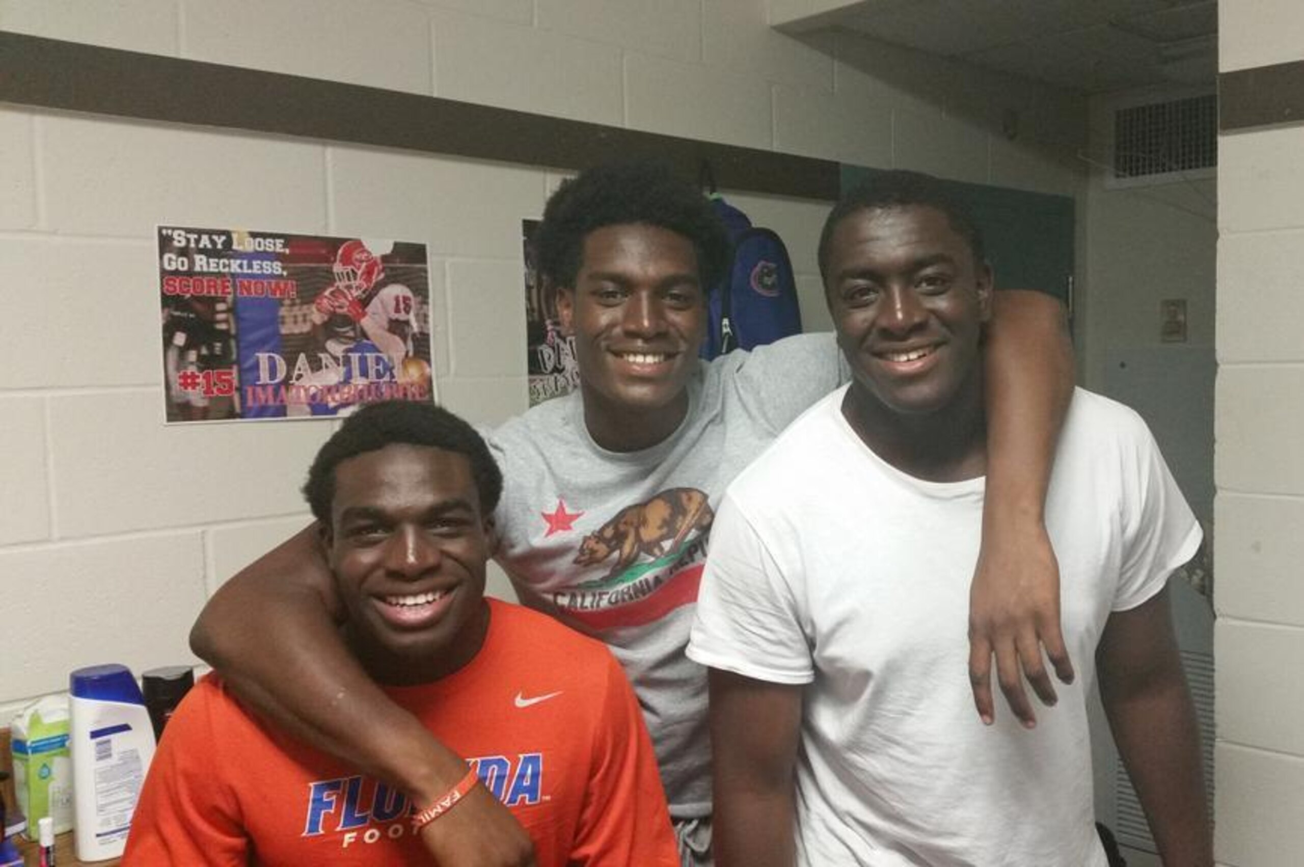 Josh left, with brothers Daniel, center, and David at Florida.