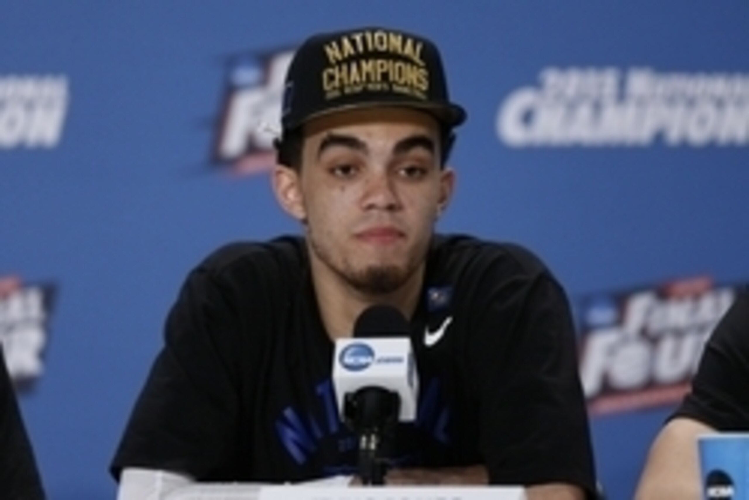 Apr 6, 2015; Indianapolis, IN, USA; Duke Blue Devils guard Tyus Jones speaks at a press conference after the game against the Wisconsin Badgers in the 2015 NCAA Men's Division I Championship at Lucas Oil Stadium. Duke won 68-63.  Mandatory Credit: Brian S